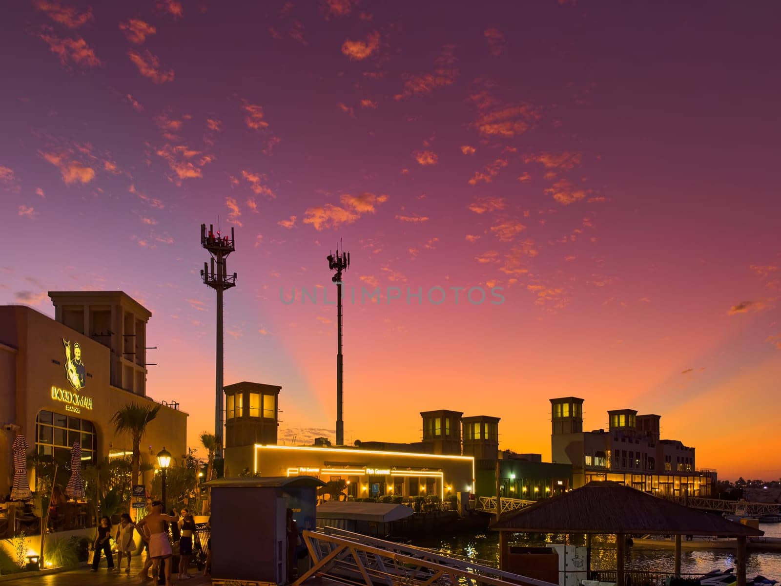 UAE, Dubai, 19 September 2024: architecture of the city at sunset, skyscrapers with glass facades. High quality photo