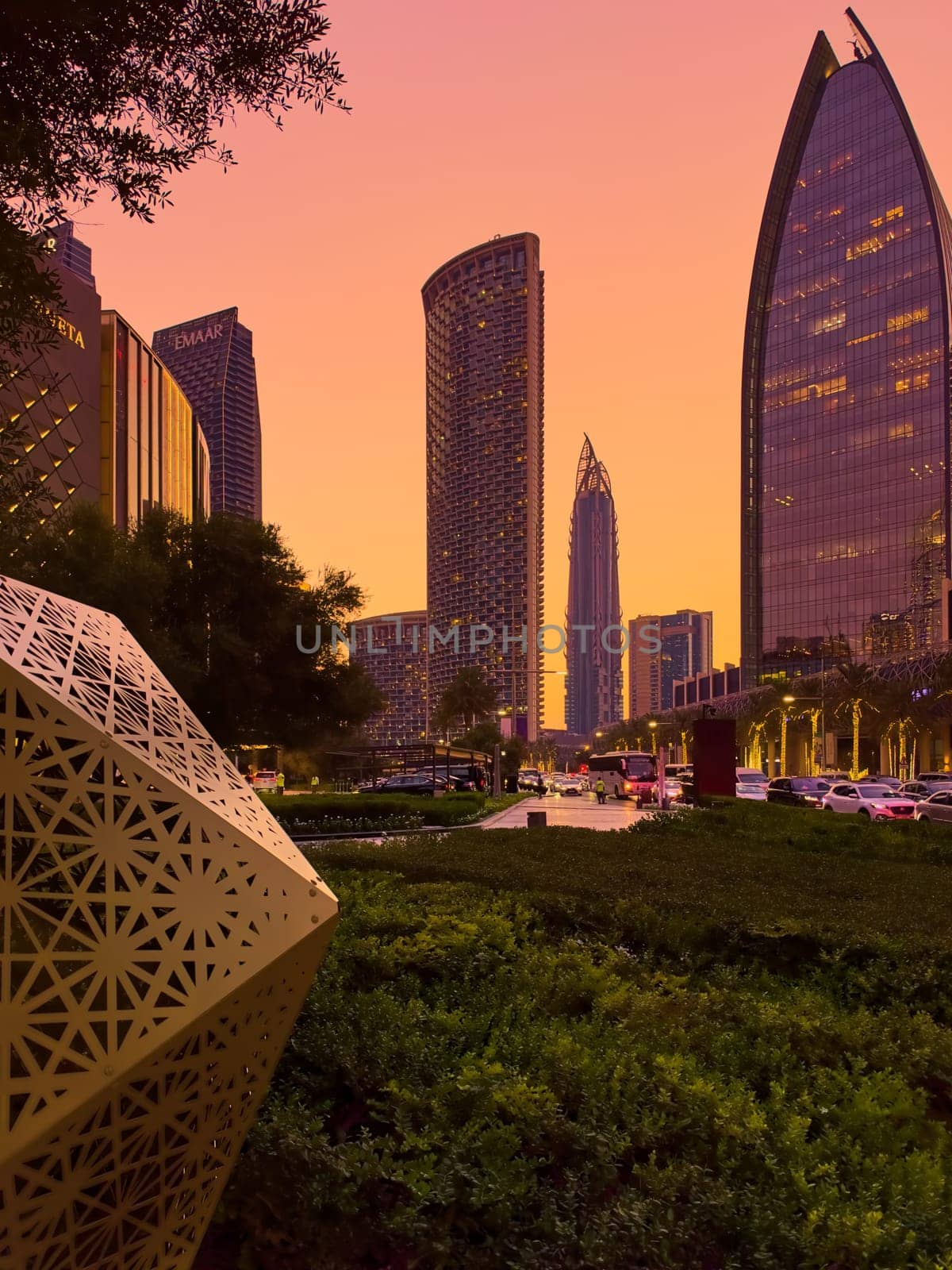 UAE, Dubai, 19 September 2024: architecture of the city at sunset, skyscrapers with glass facades. High quality photo