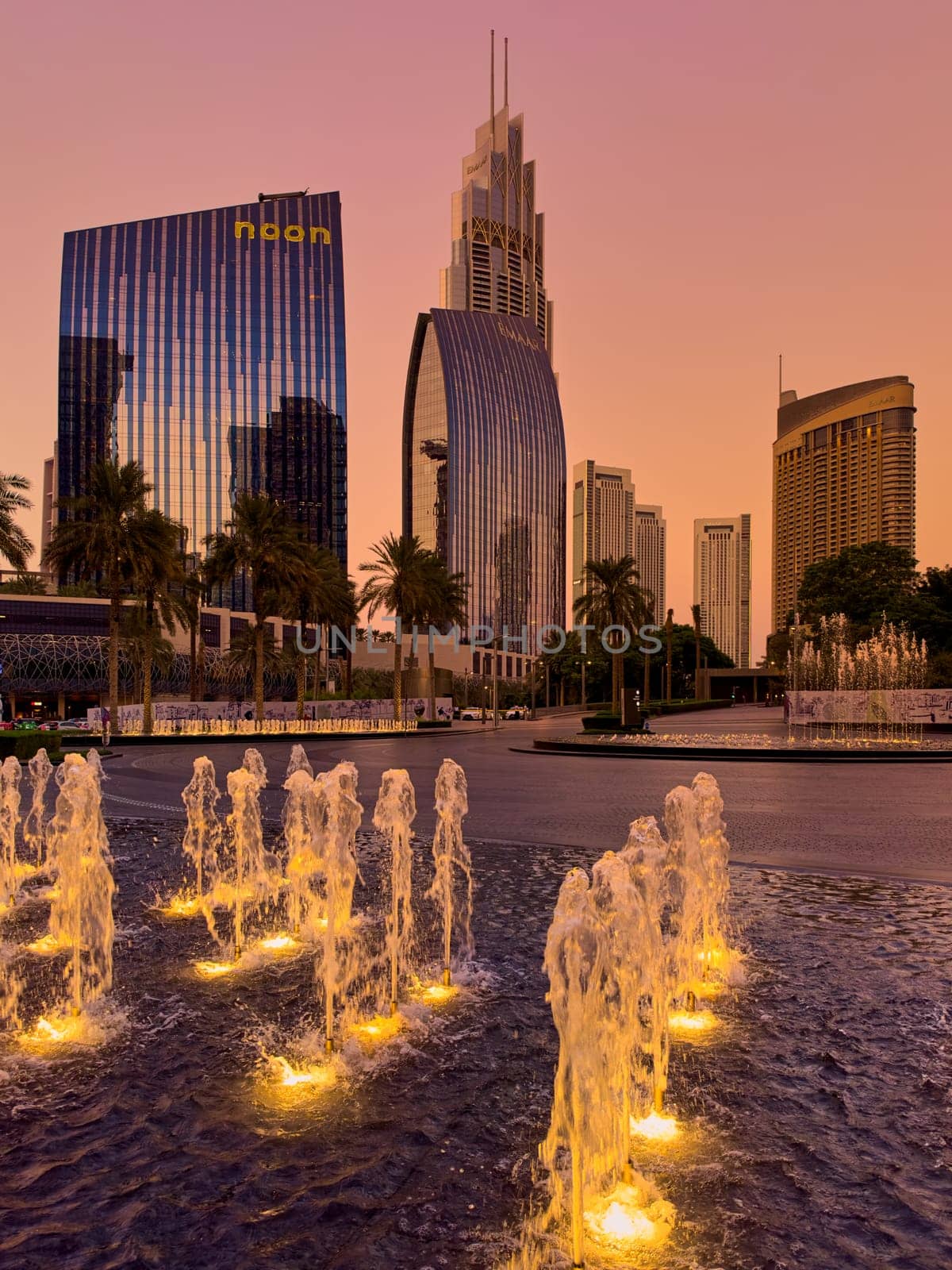 UAE, Dubai, 19 September 2024: architecture of the city at sunset, skyscrapers with glass facades. High quality photo