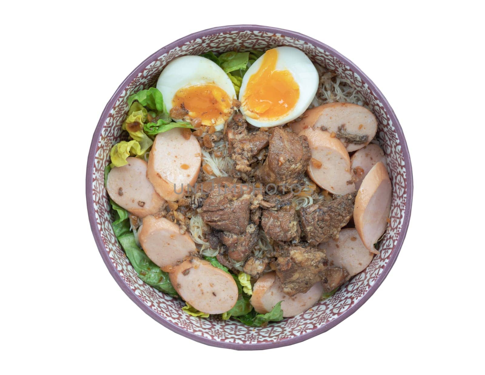Top view of Rice vermicelli noodles brown soup (thin rice noodles) with cutting sausage, boiled egg, braised pork (stewed pork) and vegetables in ceramic bowl isolated on white background with clipping path.