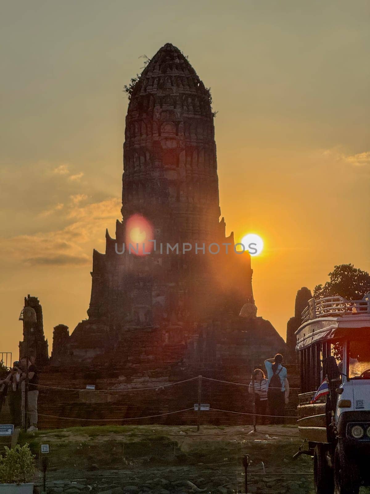 Bangkok, Thailand - November 11, 2024: Tourist visiting Wat Maha That Buddhist temple, peaceful sacred place with ancient construction. Historical Thai landmark for historic culture.