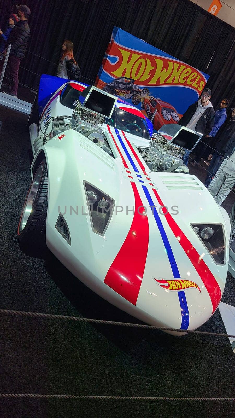 Toronto, ON Canada - 02.19.2023: Spectacular Custom Hot Wheels Car with Patriotic Stripes on Display at Automotive Exhibition.
