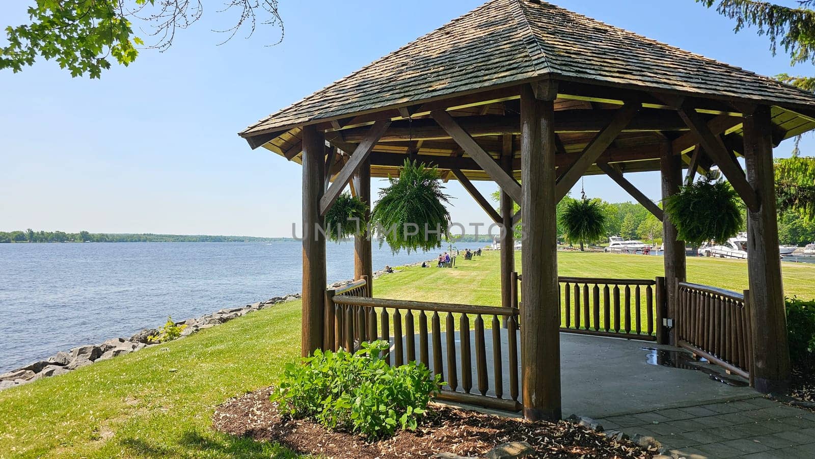 Ottawa, ON Canada - 06.04.2023: Scenic Gazebo Overlooking Water on a Sunny Day, a Peaceful Retreat and Lakeside View.