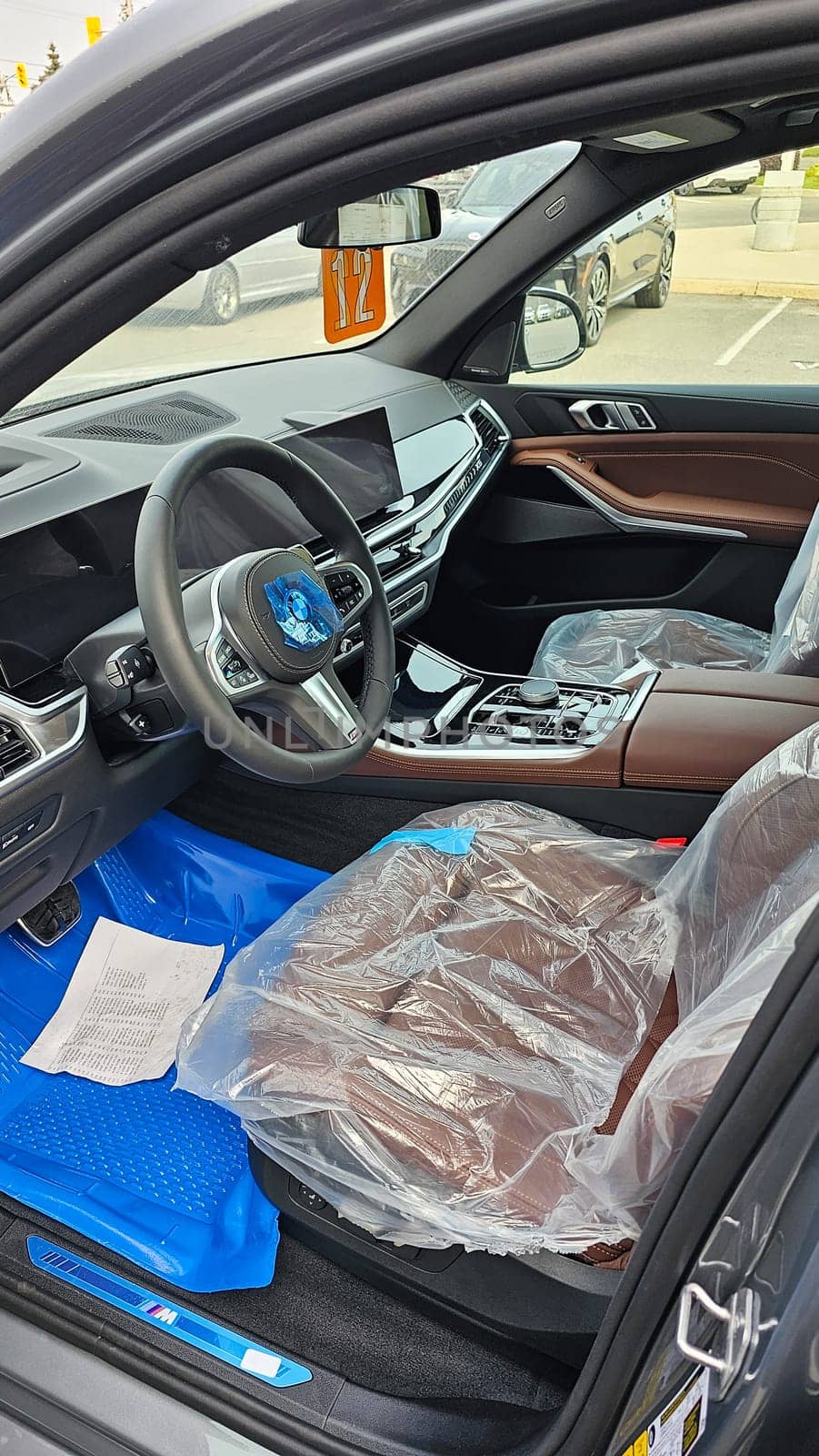 Ottawa, ON Canada - 09.27.2023: Luxury BMW Vehicle Interior with Protective Covers, Clean and Modern Design, Ready for the Road.
