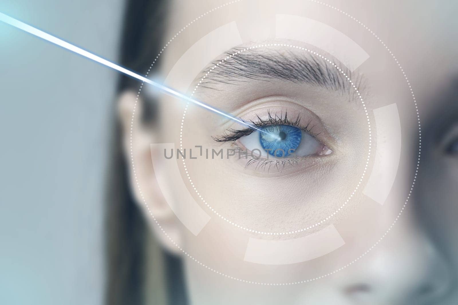 A person is receiving an advanced eye treatment in a sterile environment.