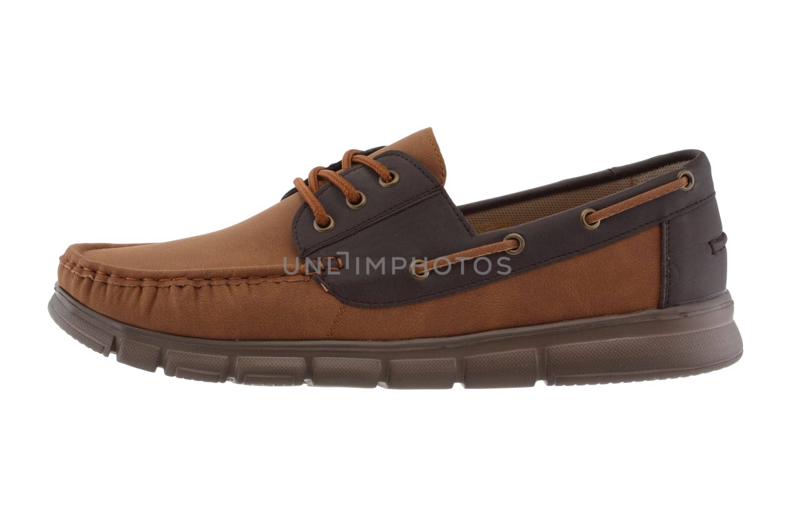A man's tan and brown shoe loafer