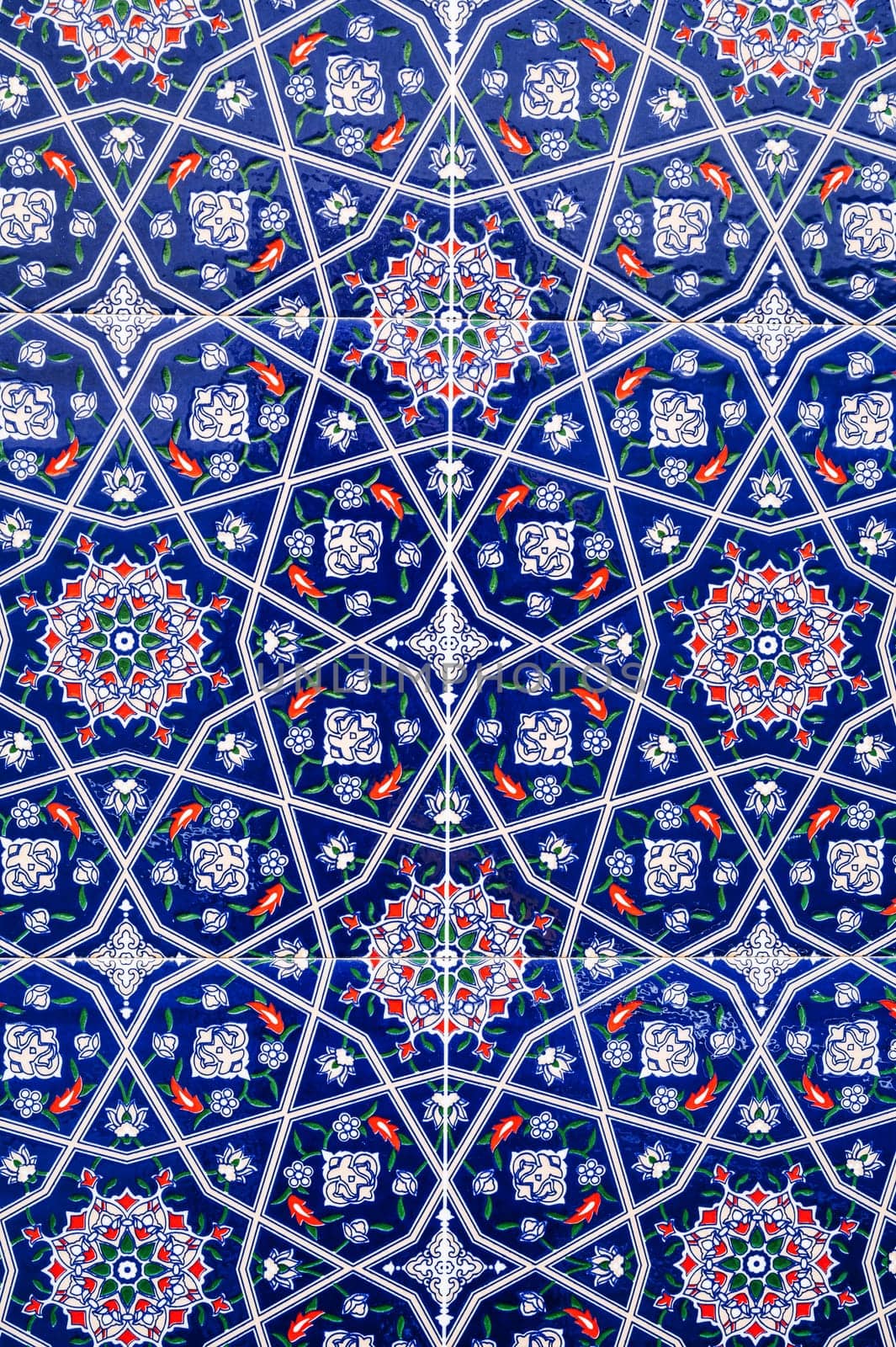 ceramic tiles with a traditional Uzbek oriental pattern in Uzbekistan. Blue decorative floral background with Islamic ornament