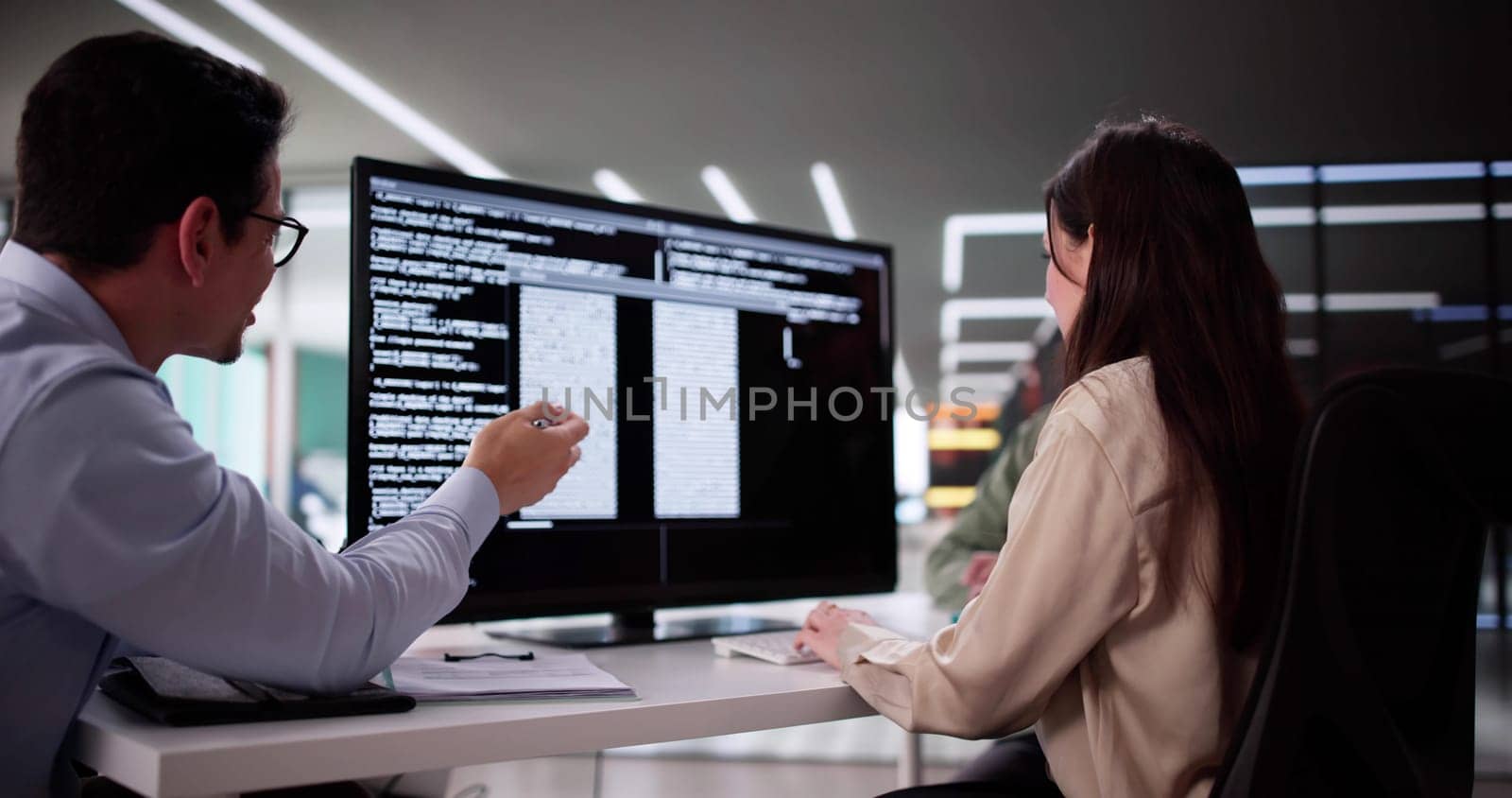 Innovative Cybersecurity Solutions By Agile Hispanic Computer Programmer In Office.