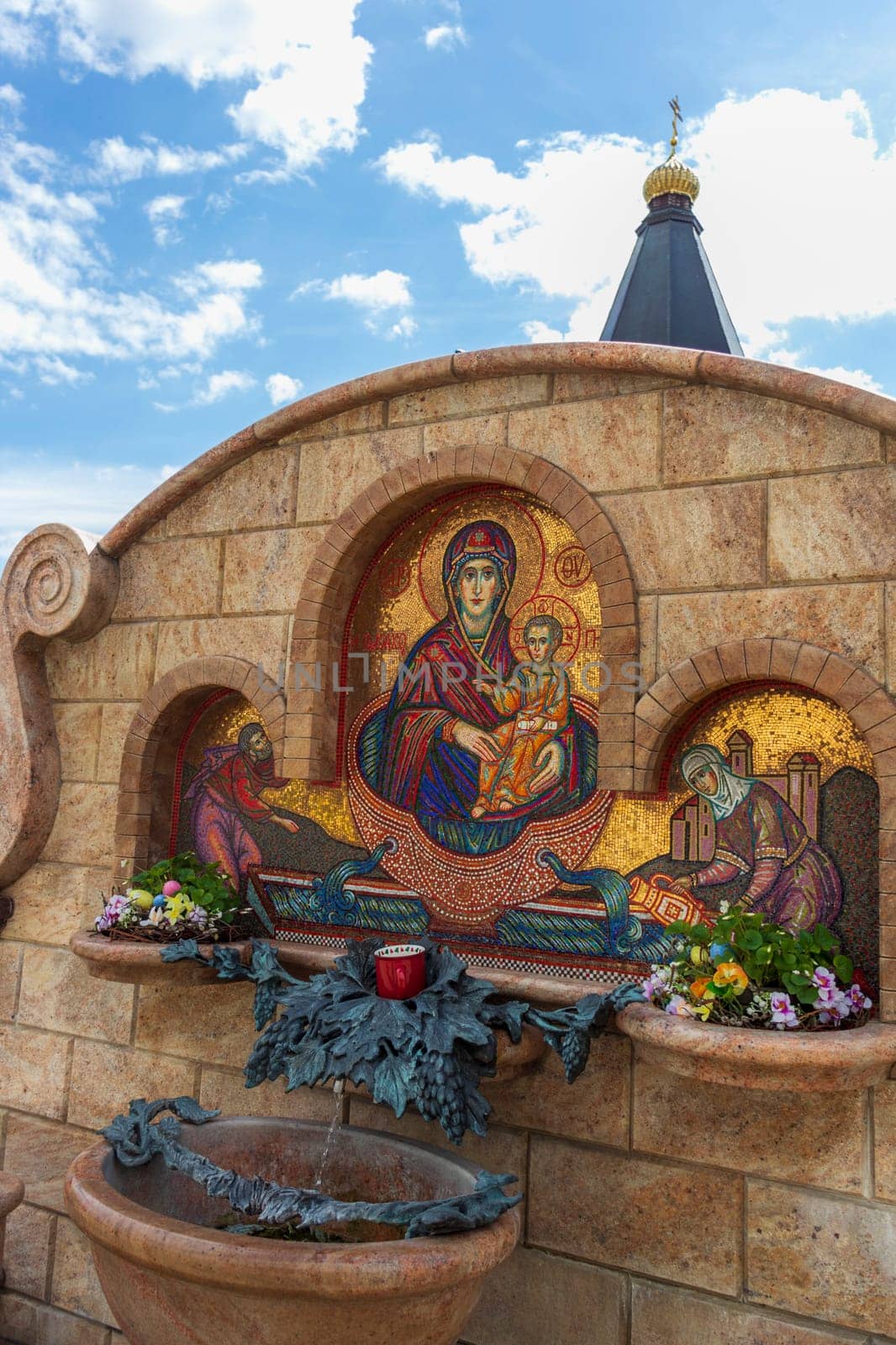 05.05.2025 - Minsk, Belarus. Pump with what to believed to be a holy water at church of all saints