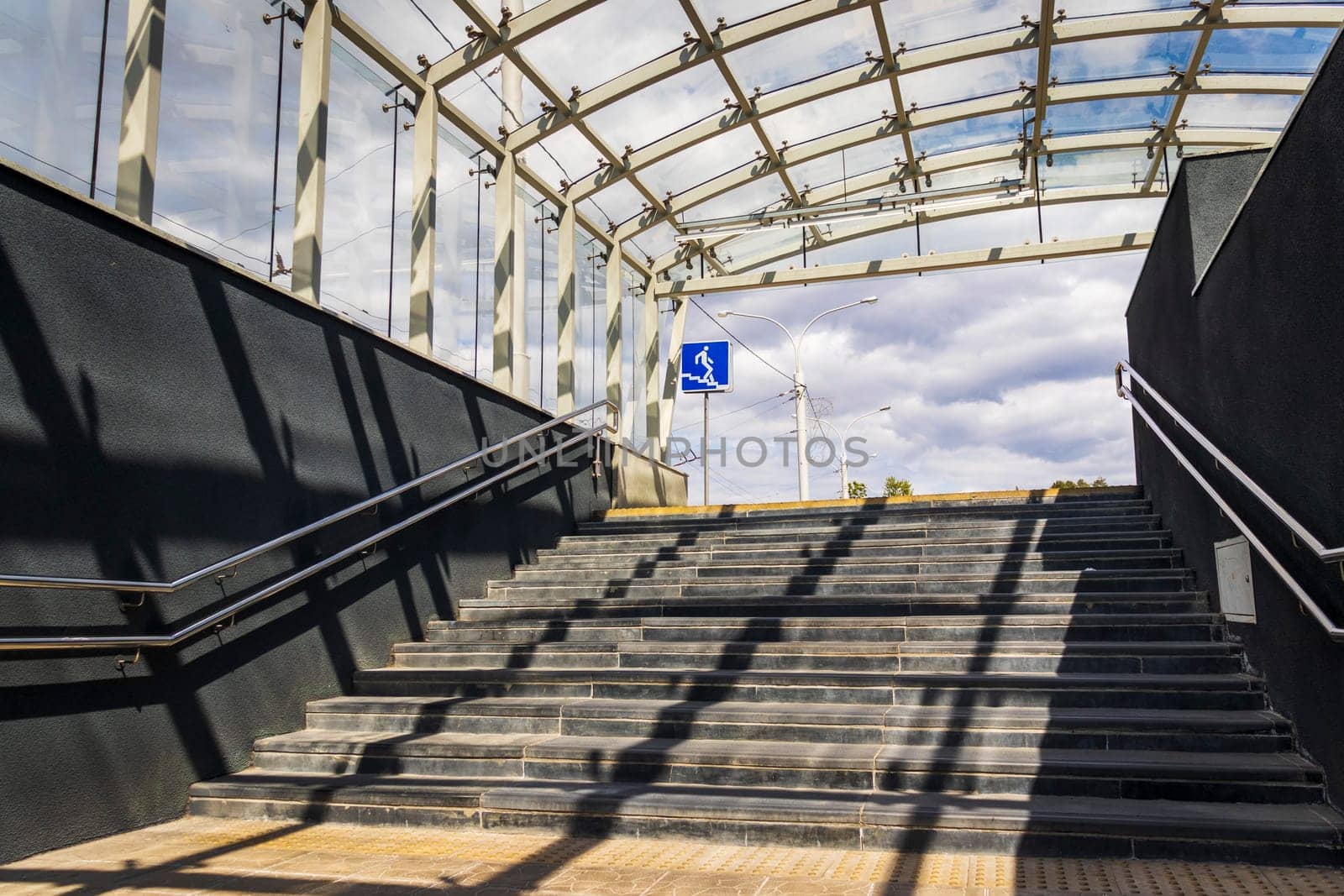 Stairs leading up from pedestrian crossing