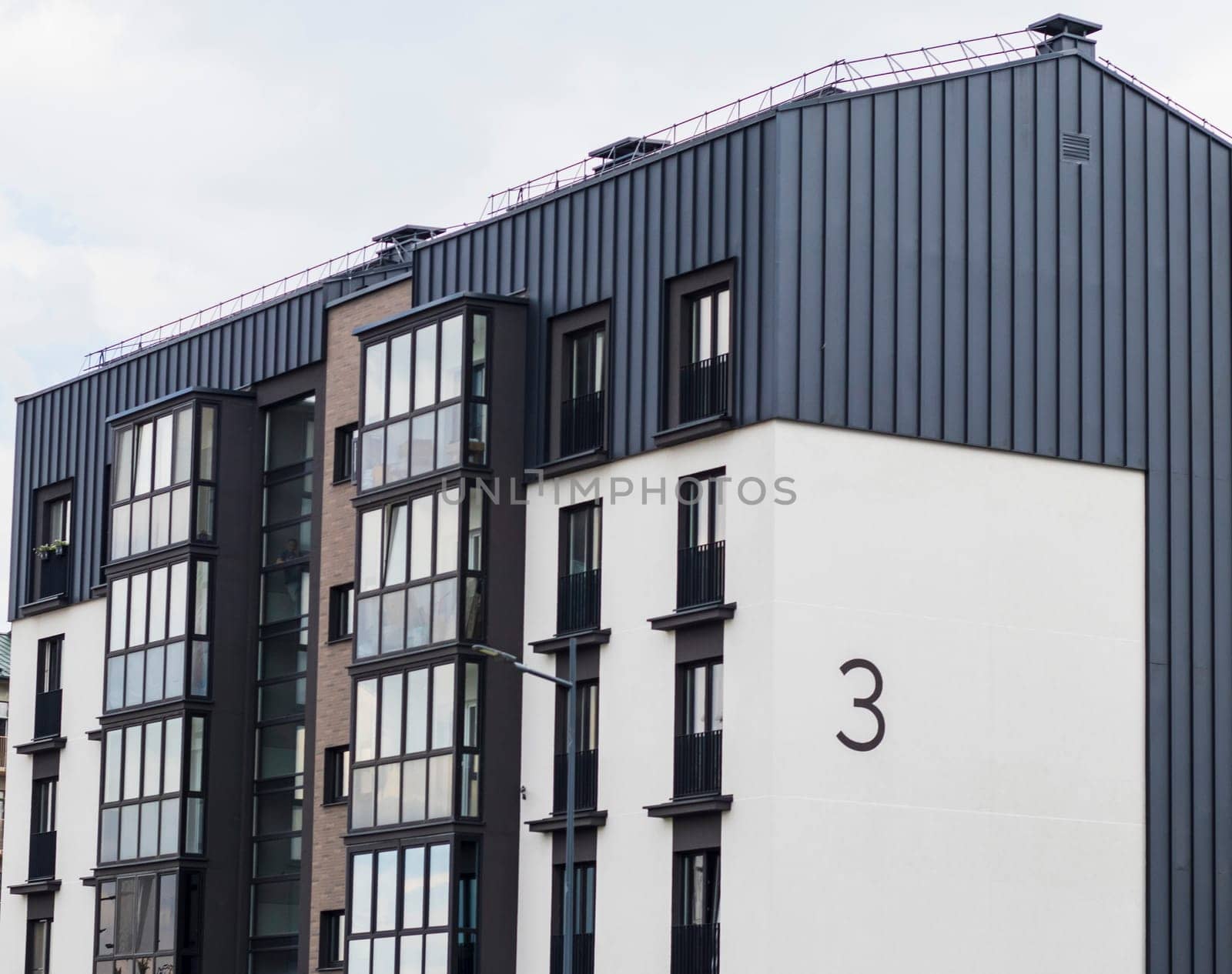 Shot of the stylish, modern, urban, residential suburb where buildings have ergonomic design and vivid colors