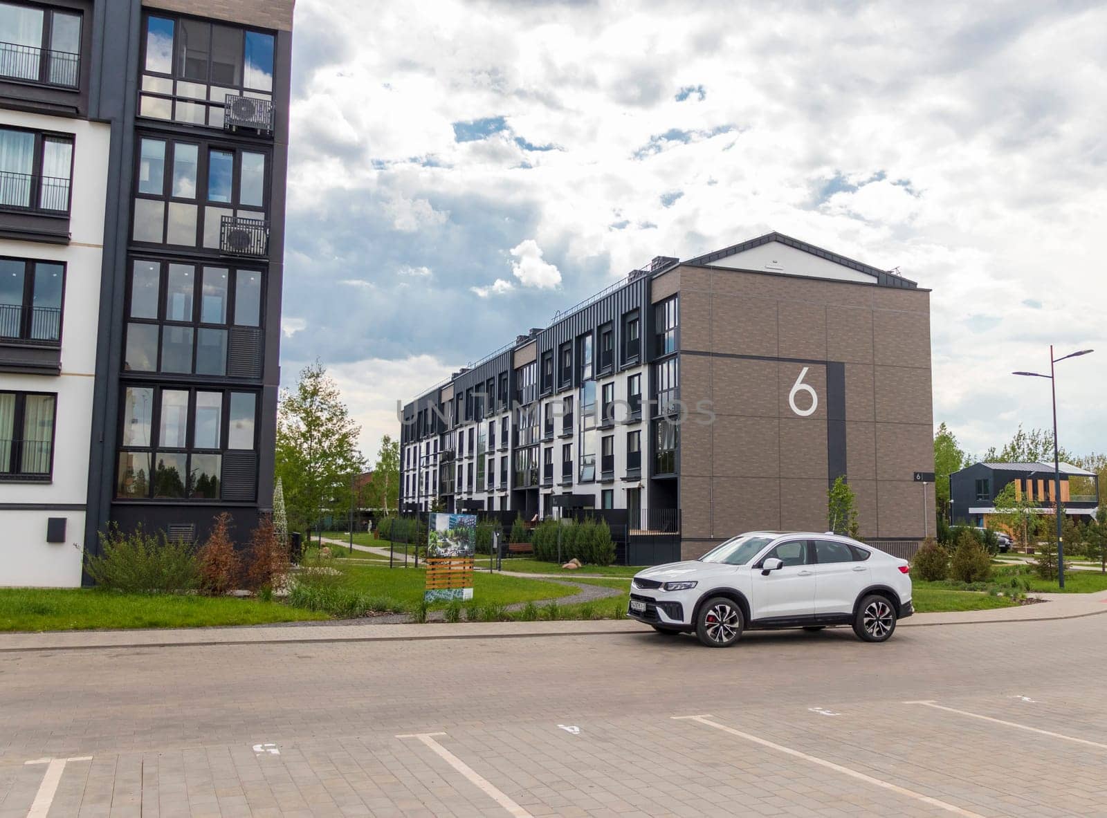 Shot of the stylish, modern, urban, residential suburb where buildings have ergonomic design and vivid colors