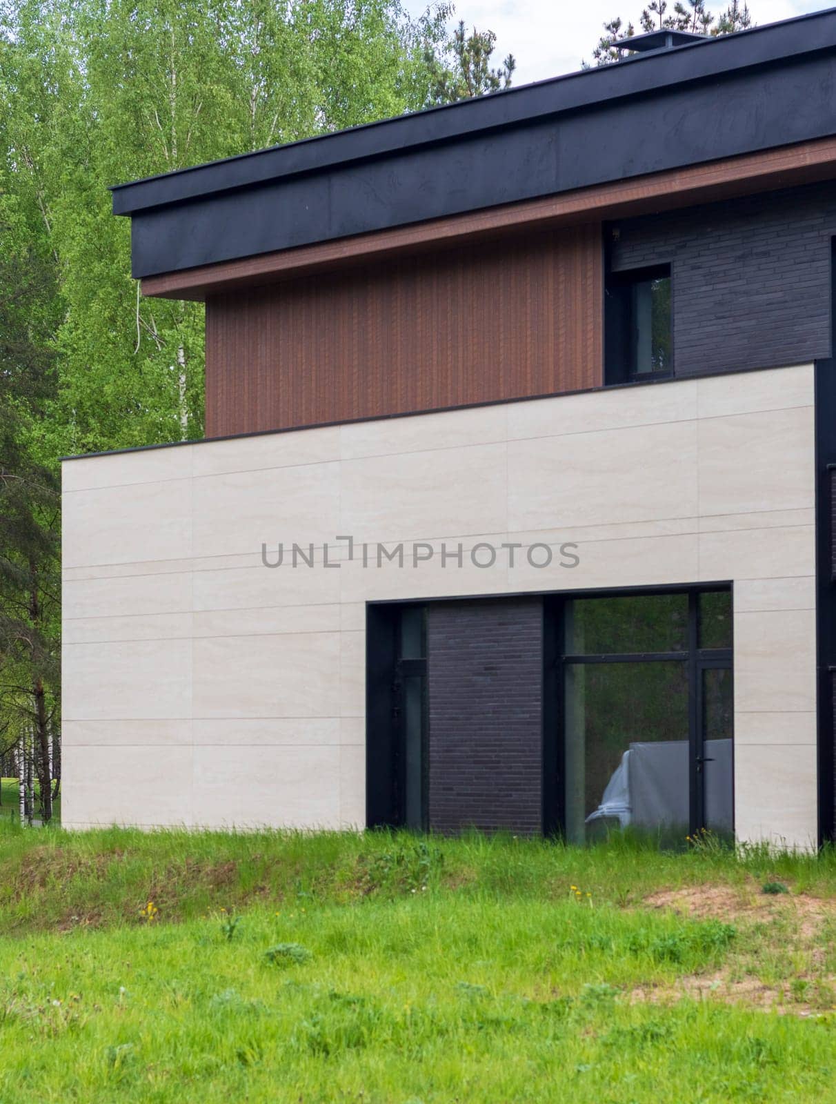 Facade of the stylish, urban, modern house, ergonomically designed and made of ecological materials