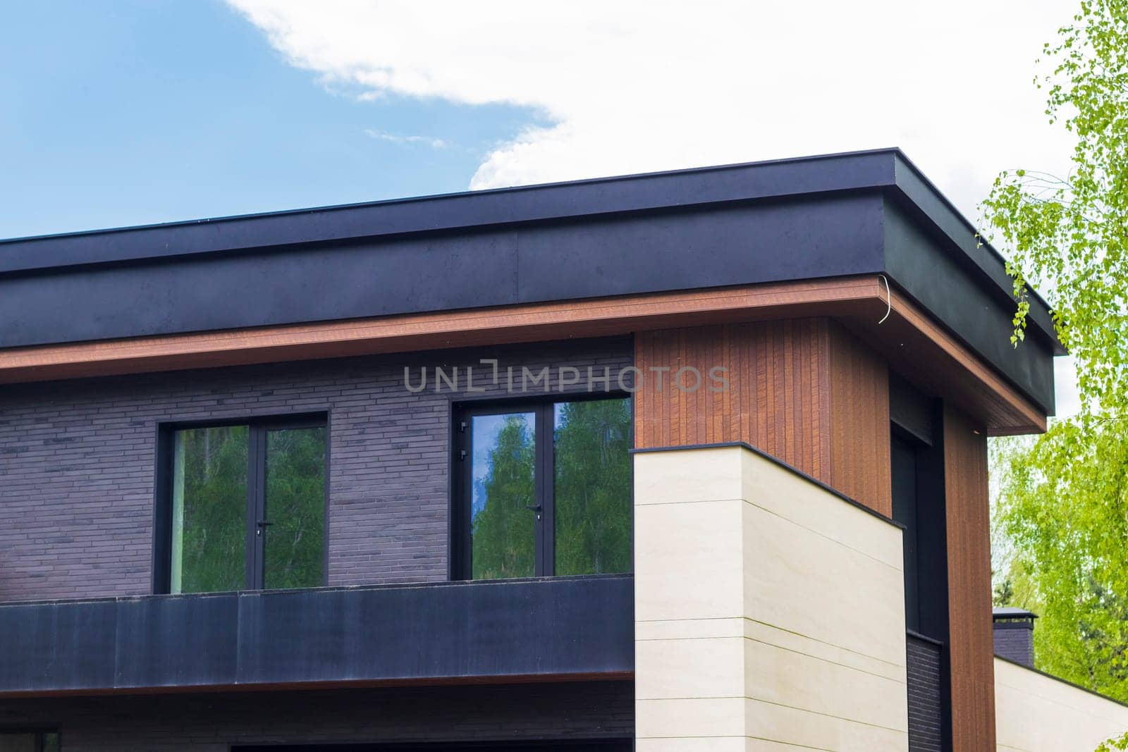 Facade of the stylish, urban, modern house, ergonomically designed and made of ecological materials