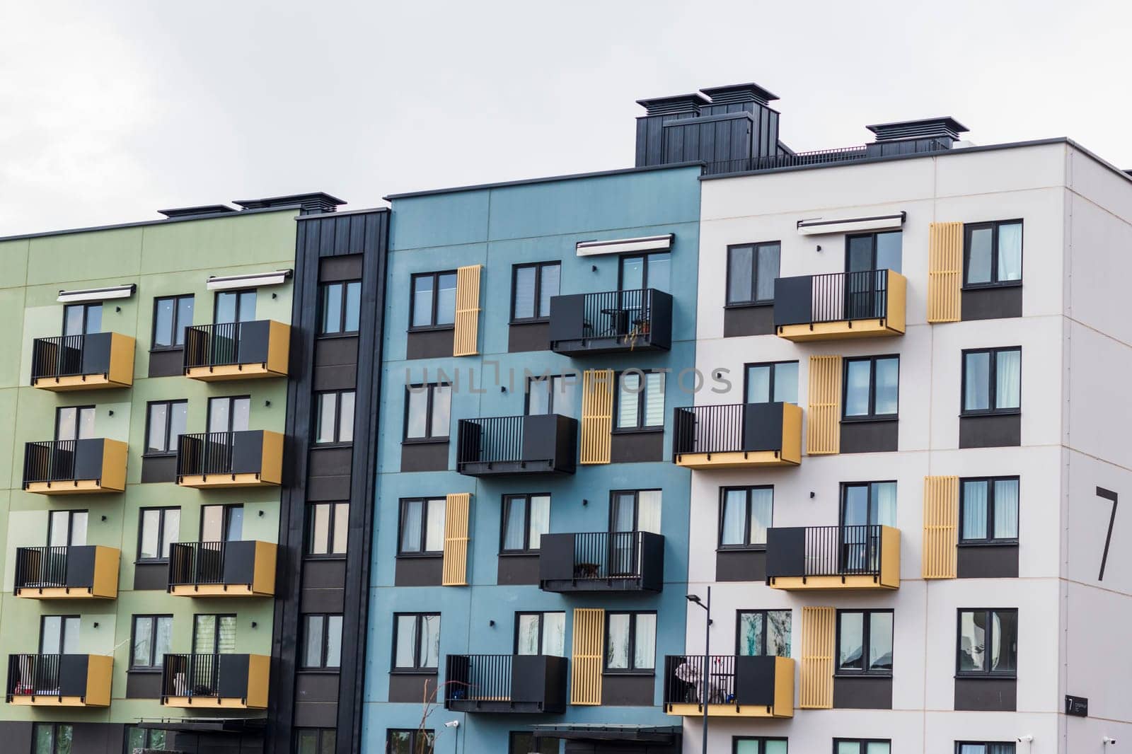 Shot of the stylish, modern, urban, residential suburb where buildings have ergonomic design and vivid colors