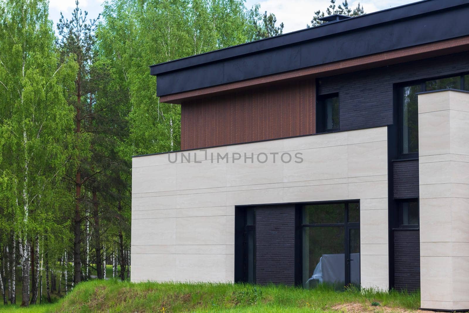 Facade of the stylish, urban, modern house, ergonomically designed and made of ecological materials