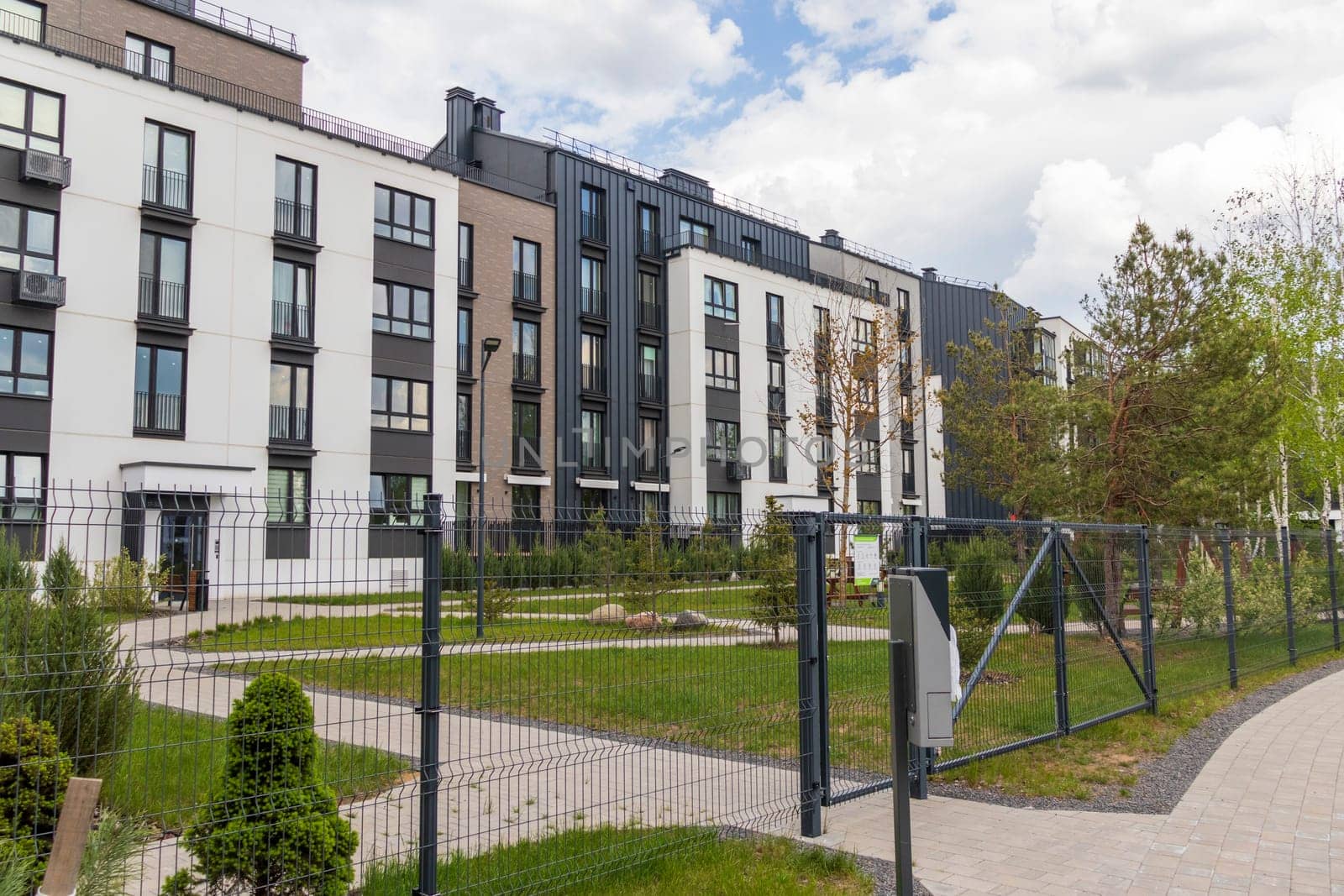 Shot of the stylish, modern, urban, residential suburb where buildings have ergonomic design and vivid colors