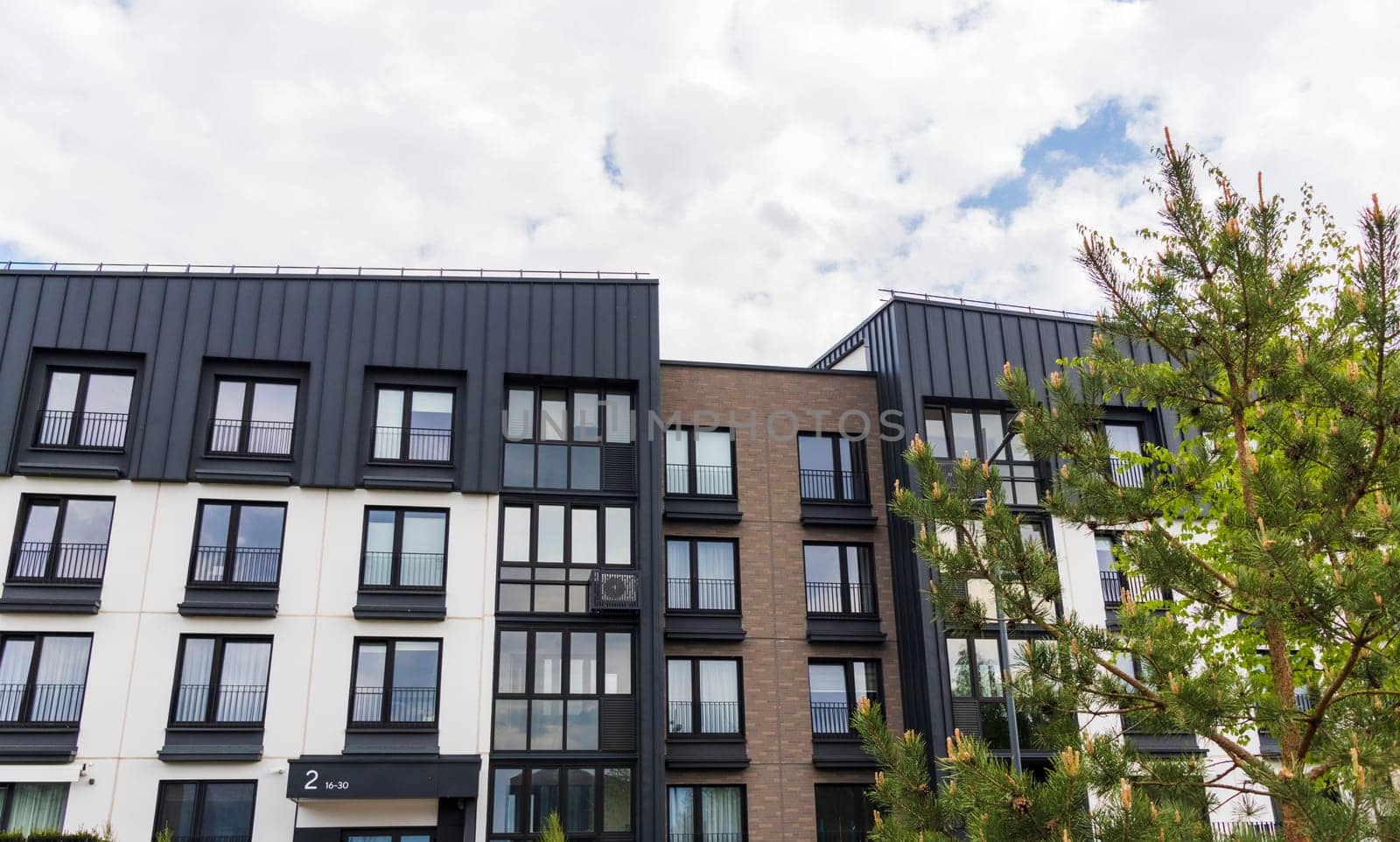 Shot of the stylish, modern, urban, residential suburb where buildings have ergonomic design and vivid colors