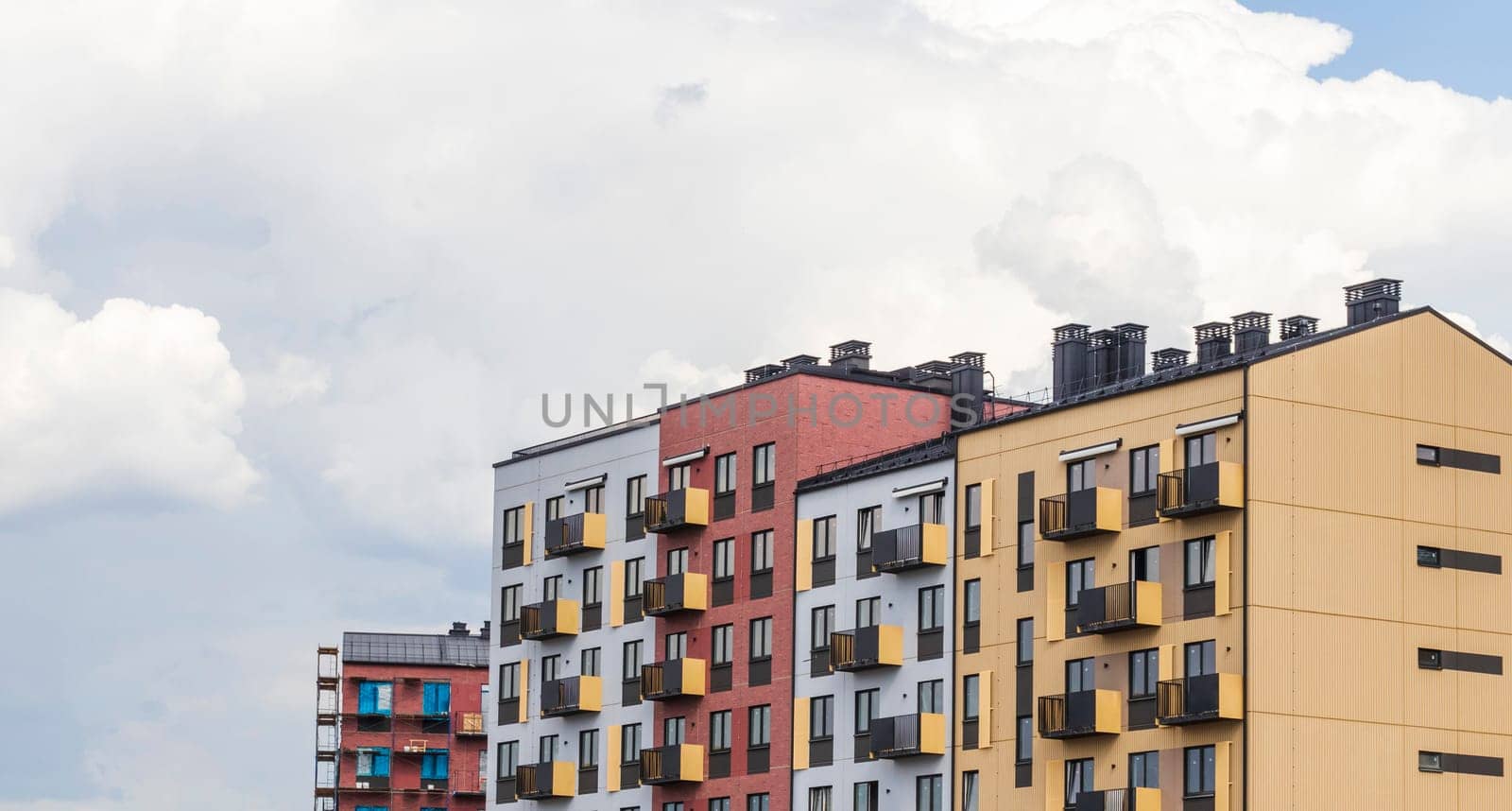 Shot of the stylish, modern, urban, residential suburb where buildings have ergonomic design and vivid colors