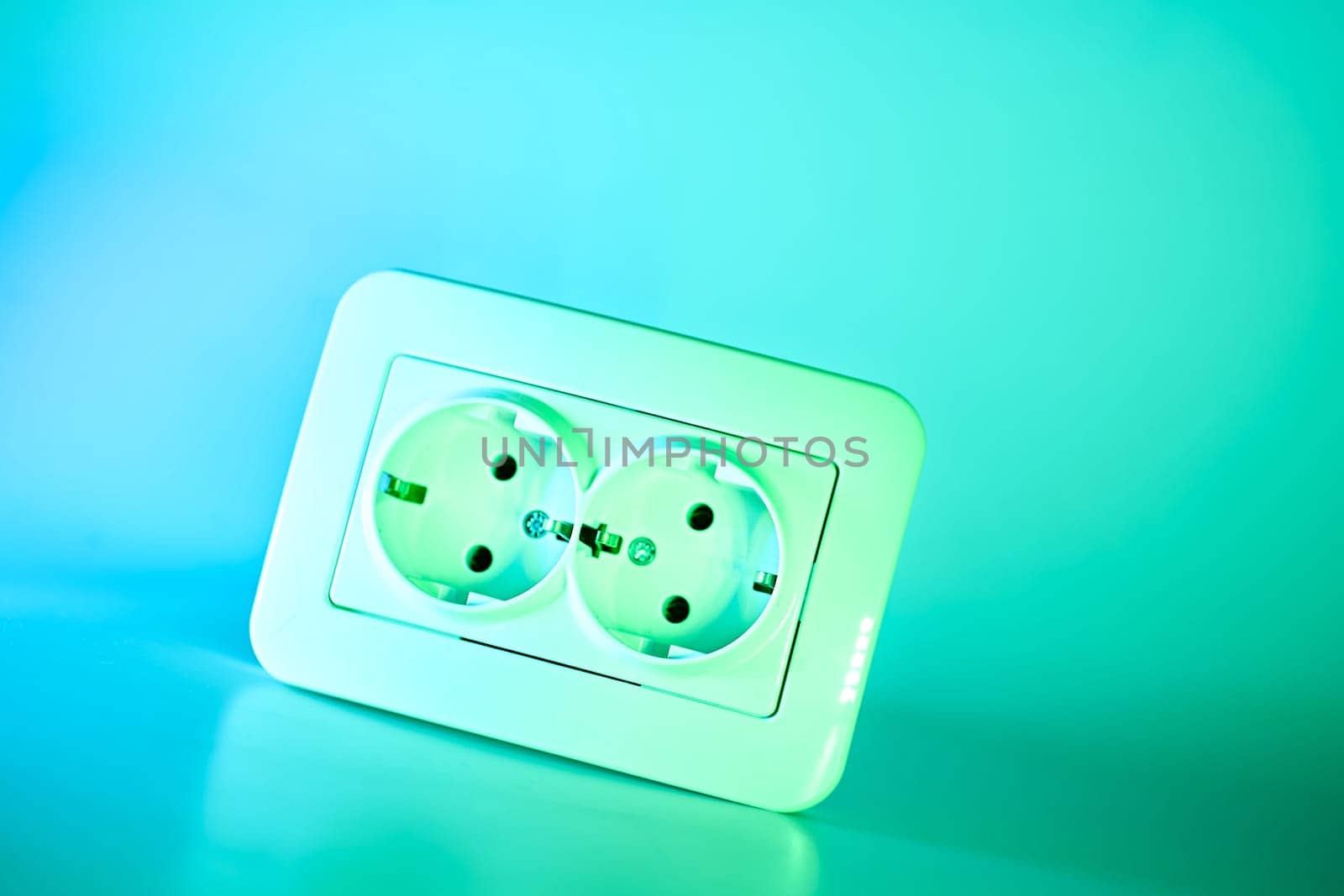 able to be connected by means of a plug. an electrical device receiving a plug or light bulb to make a connection