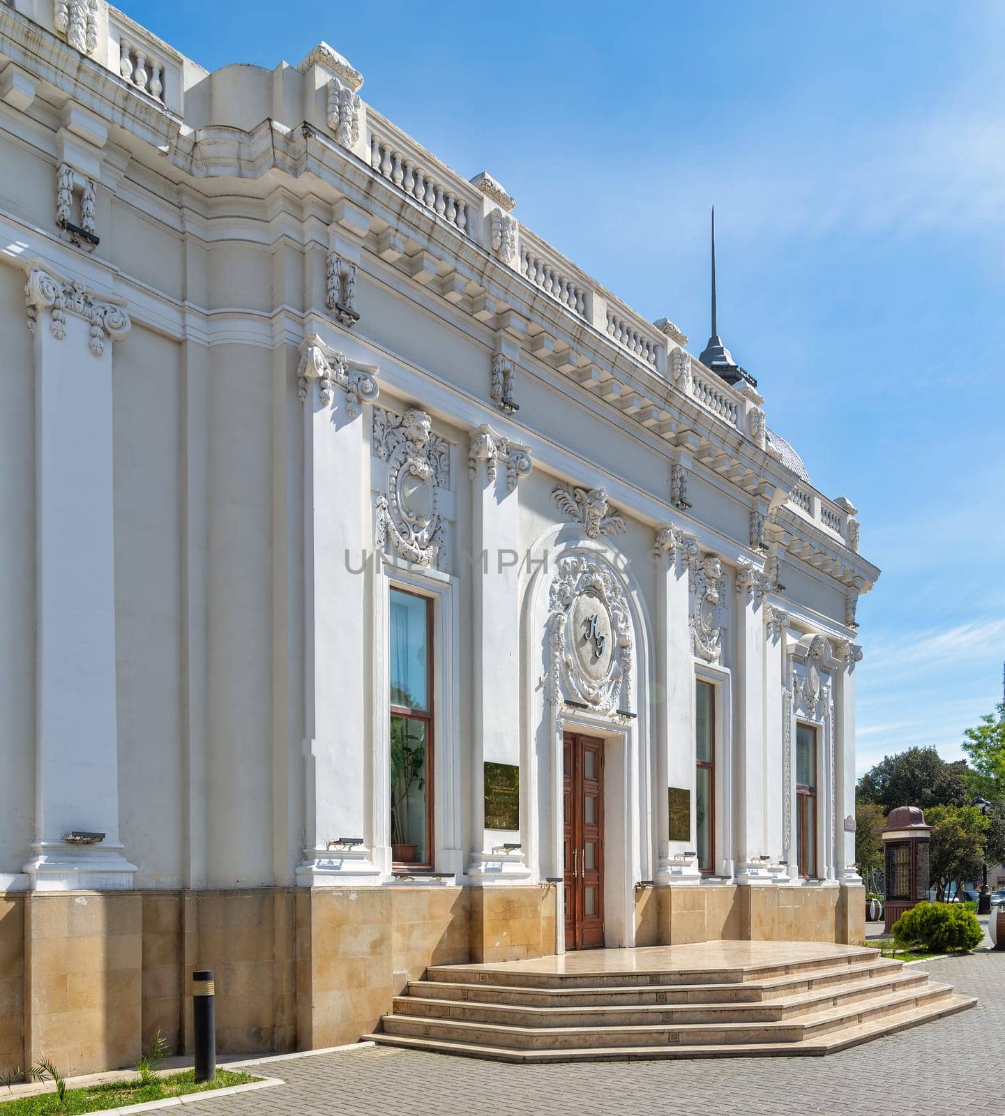 The Azerbaijan State Puppet Theatre in Baku is an architectural marvel characterized by its pristine white facade and intricate ornamentation