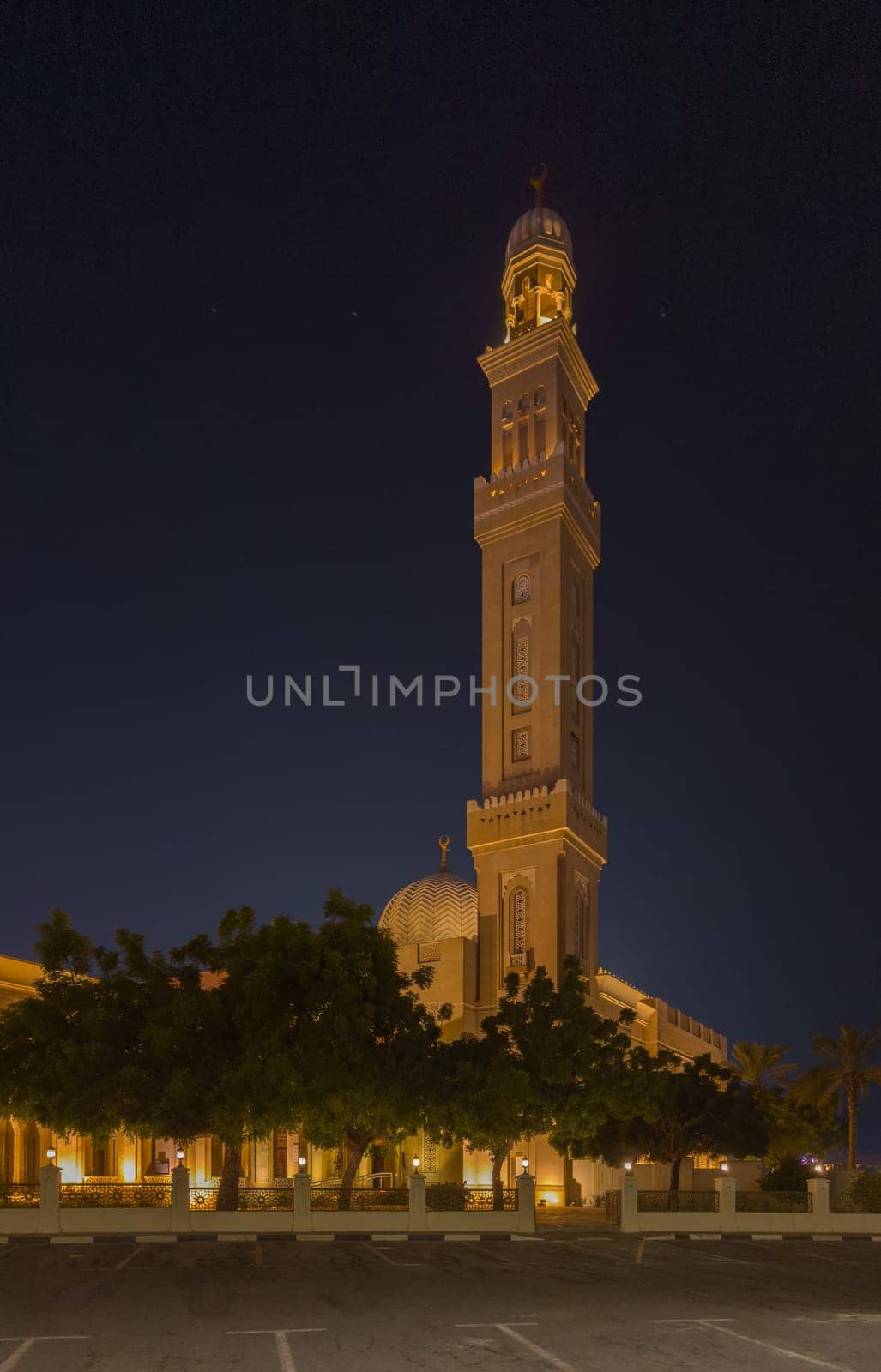 UAE, Dubai, 23 September 2024: Illuminated Jumeirah mosque Masjid Rawda Al Abrar Mosque at dusk, It is also an educational center for cultural understanding. Muslim religion concept. High quality photo