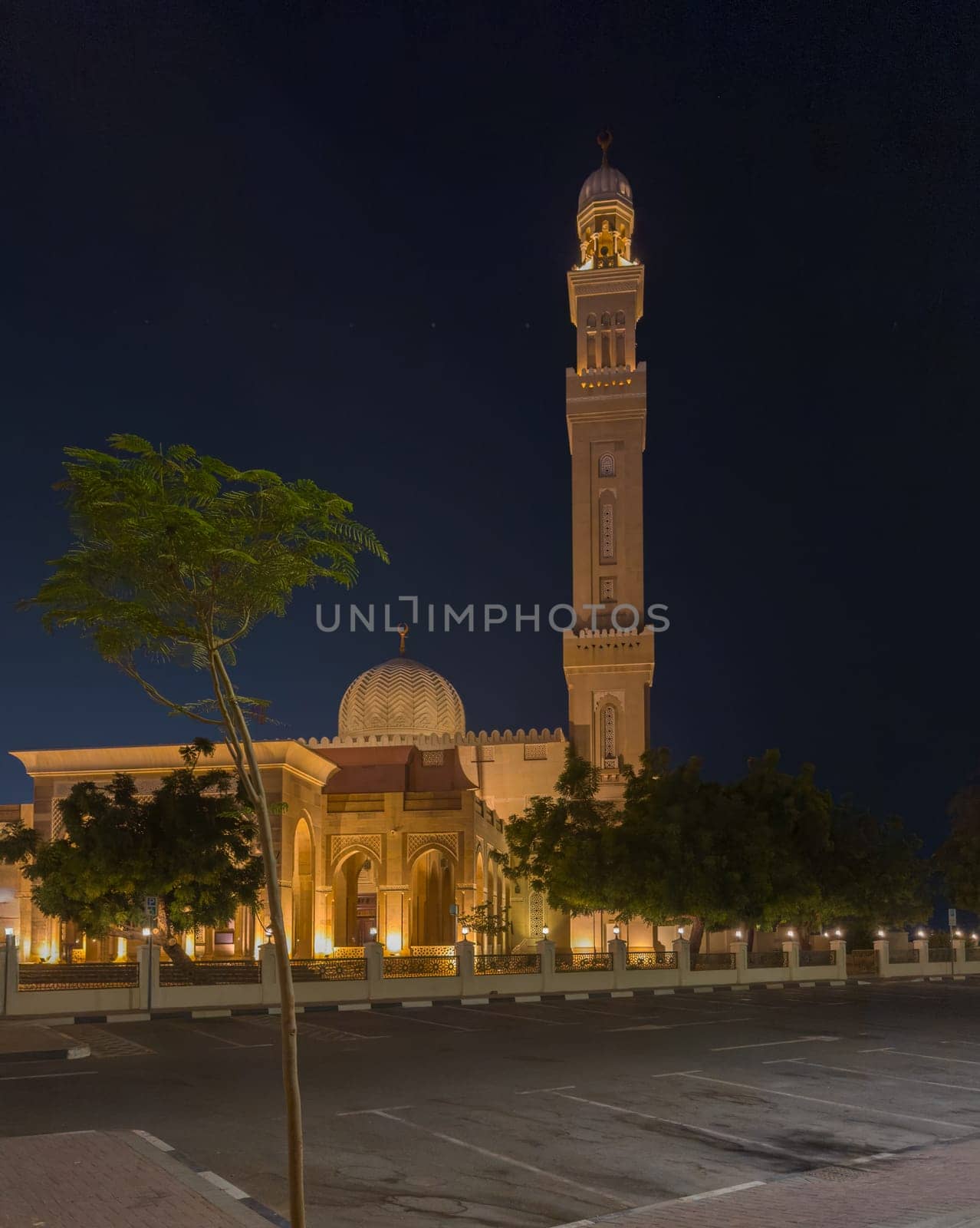 UAE, Dubai, 23 September 2024: Illuminated Jumeirah mosque Masjid Rawda Al Abrar Mosque at dusk, It is also an educational center for cultural understanding. Muslim religion concept. High quality photo