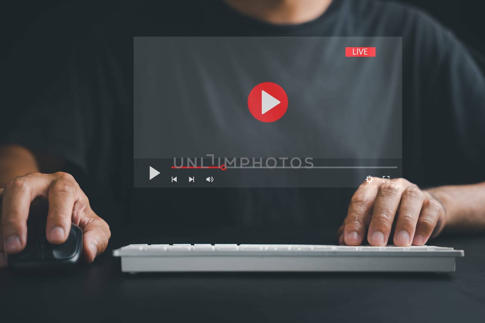 Experience the convenience of online connectivity as a man uses a computer for video streaming, attending live events, and engaging with educational tutorials.