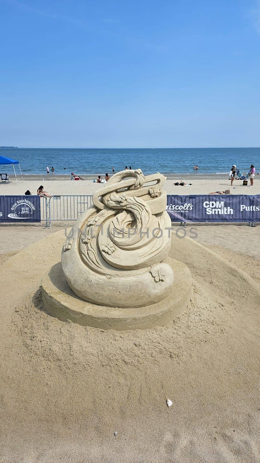 Boston, MA USA - 08.05.2024: Fantasy Sand Sculpture Dragon on Beach, Creative Art, Seaside Scene, Summer Vacation.