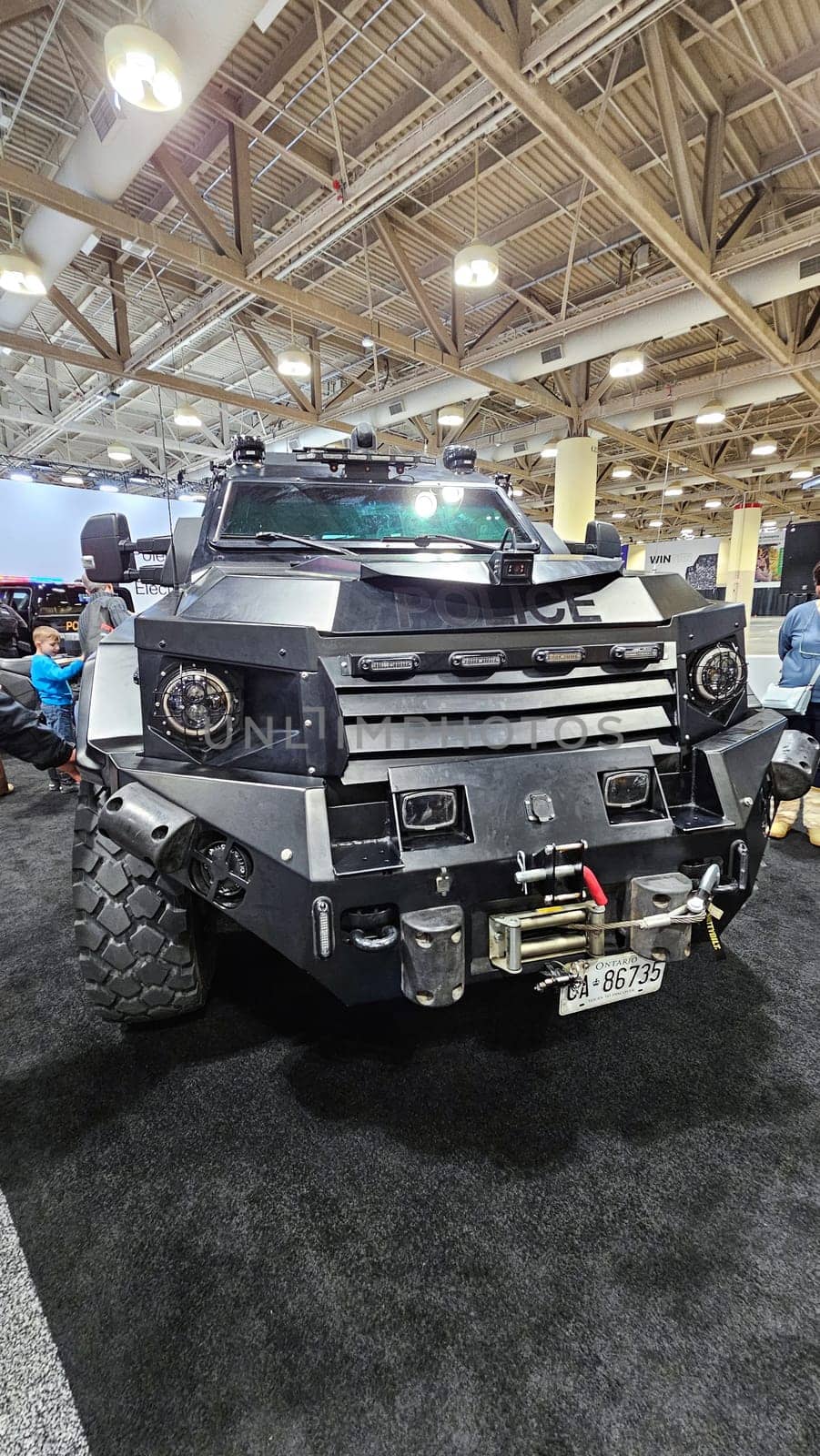 Toronto, ON Canada - 02.16.2025: Tactical Armored Vehicle Displaying Robustness, Strength, and State-of-the-Art Technology