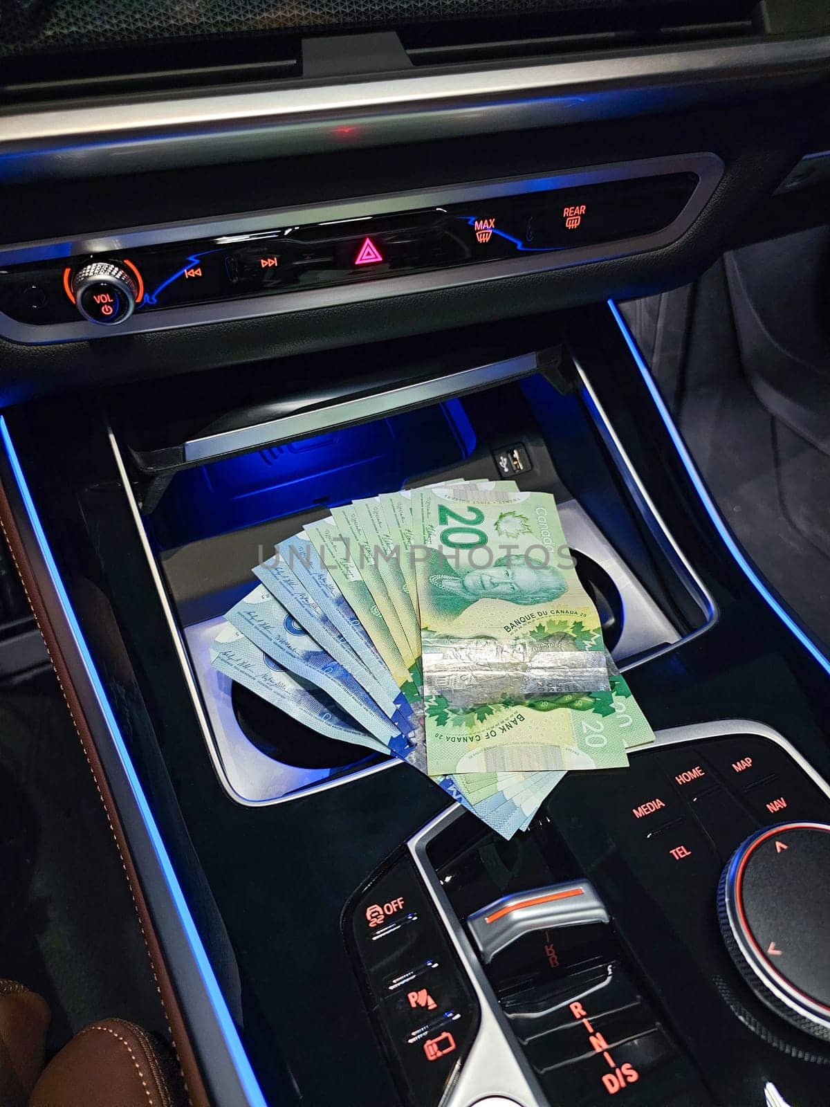 A luxurious car interior featuring plush leather seats and elegant finishes, paired with a stylish collection of banknotes, symbolizing financial readiness for exciting journeys and opportunities.