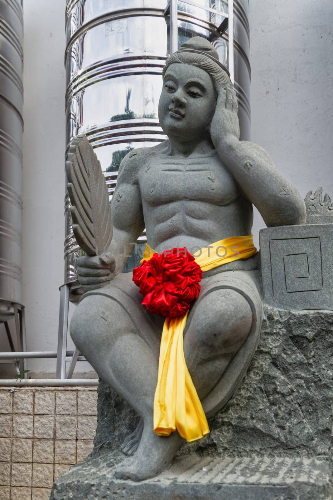 Kuala Lumpur, Malaysia - Feb. 19, 2025: Statue no.19 of the 24 Filial Exemplars collection at Thean Hou Temple, depicts Wu Meng, who let mosquitoes bite him to satisfy his parents