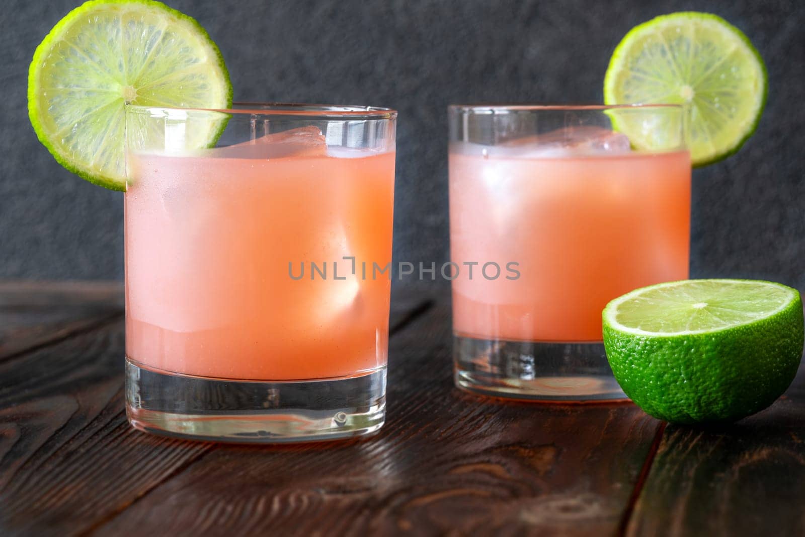 Guava, lime, and tequila blend in tropical harmony with citrus-laced elegance
