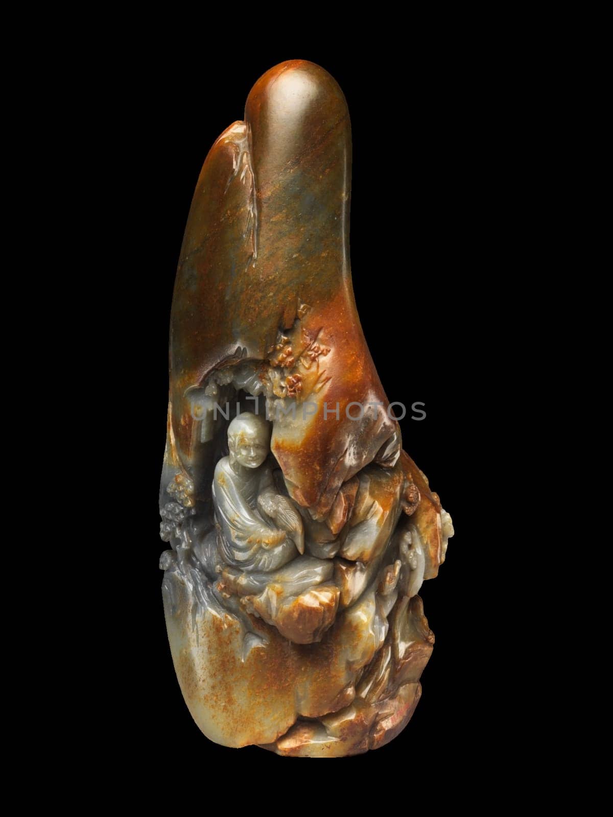 Late 18th-century Chinese carving of a seated Luohan (Arhat) holding a fan, in variegated jade. Expressive detail, spiritual representation.