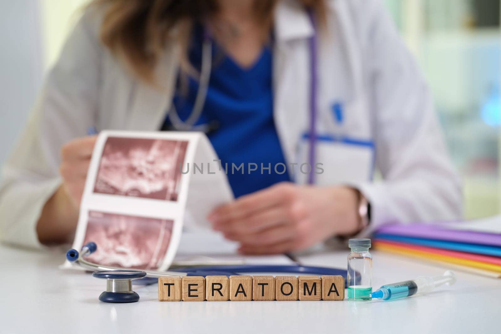 A medical doctor meticulously analyzing various medical images while discussing teratomas in a clinical setting