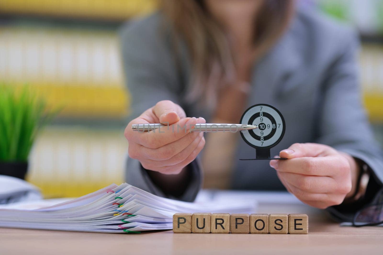 An individual who is effectively demonstrating goalsetting and a strong sense of purpose within a business environment