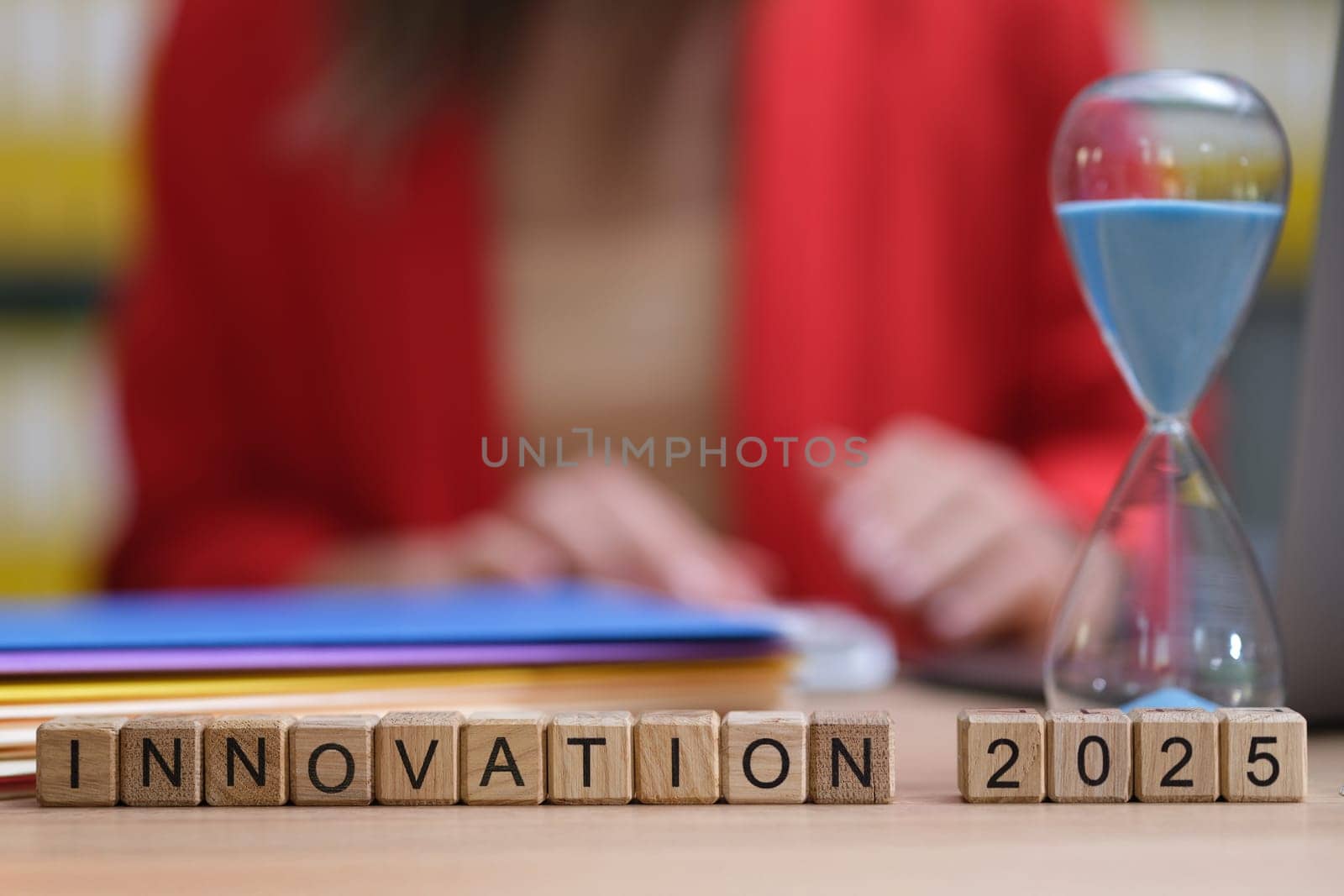 Exploring 2025s vibrant innovation trends, represented by an hourglass symbolizing time and progress