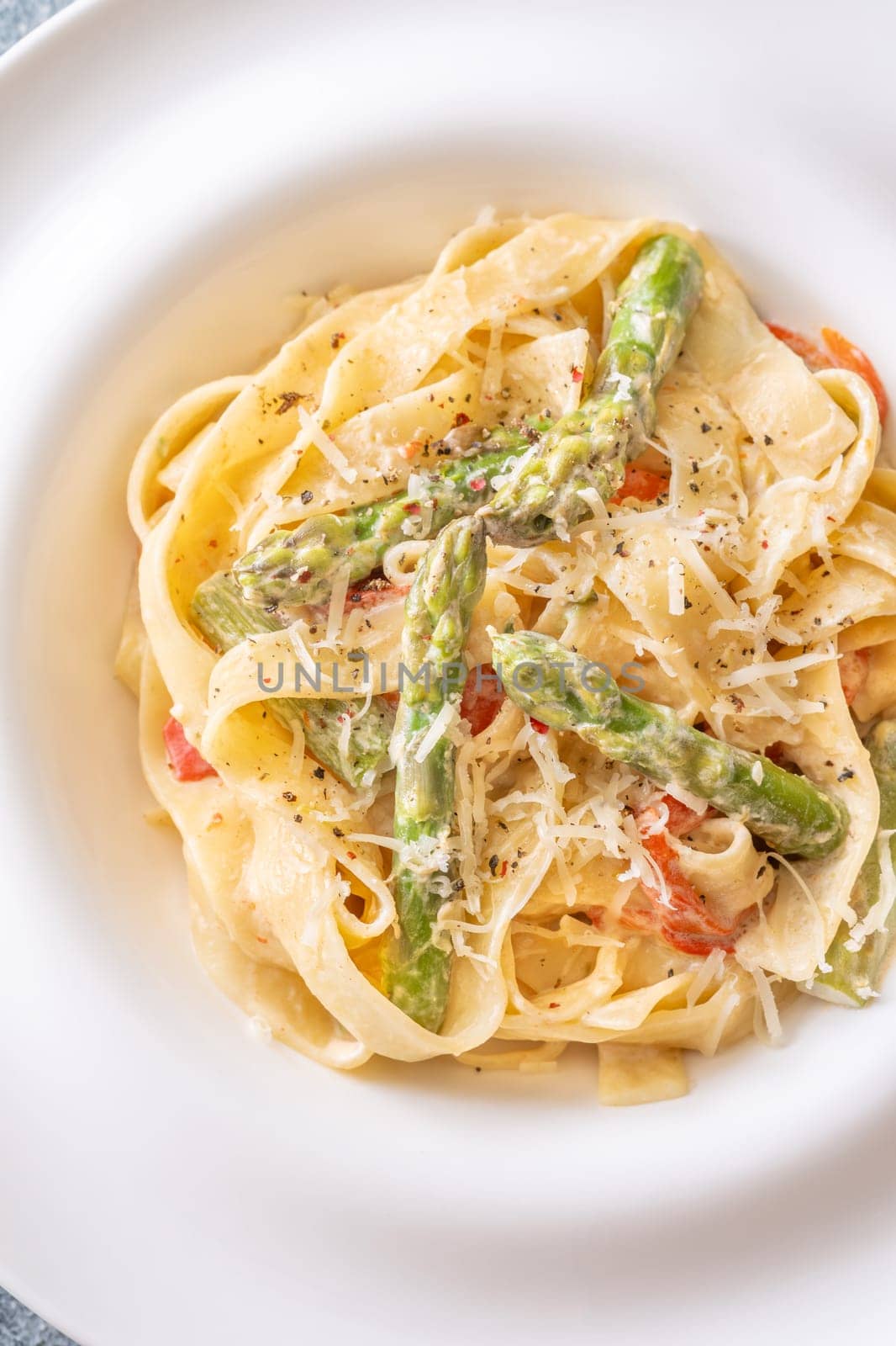Silky noodles wrapped in sauce, crisp vegetables and cheese complete this comfort dish