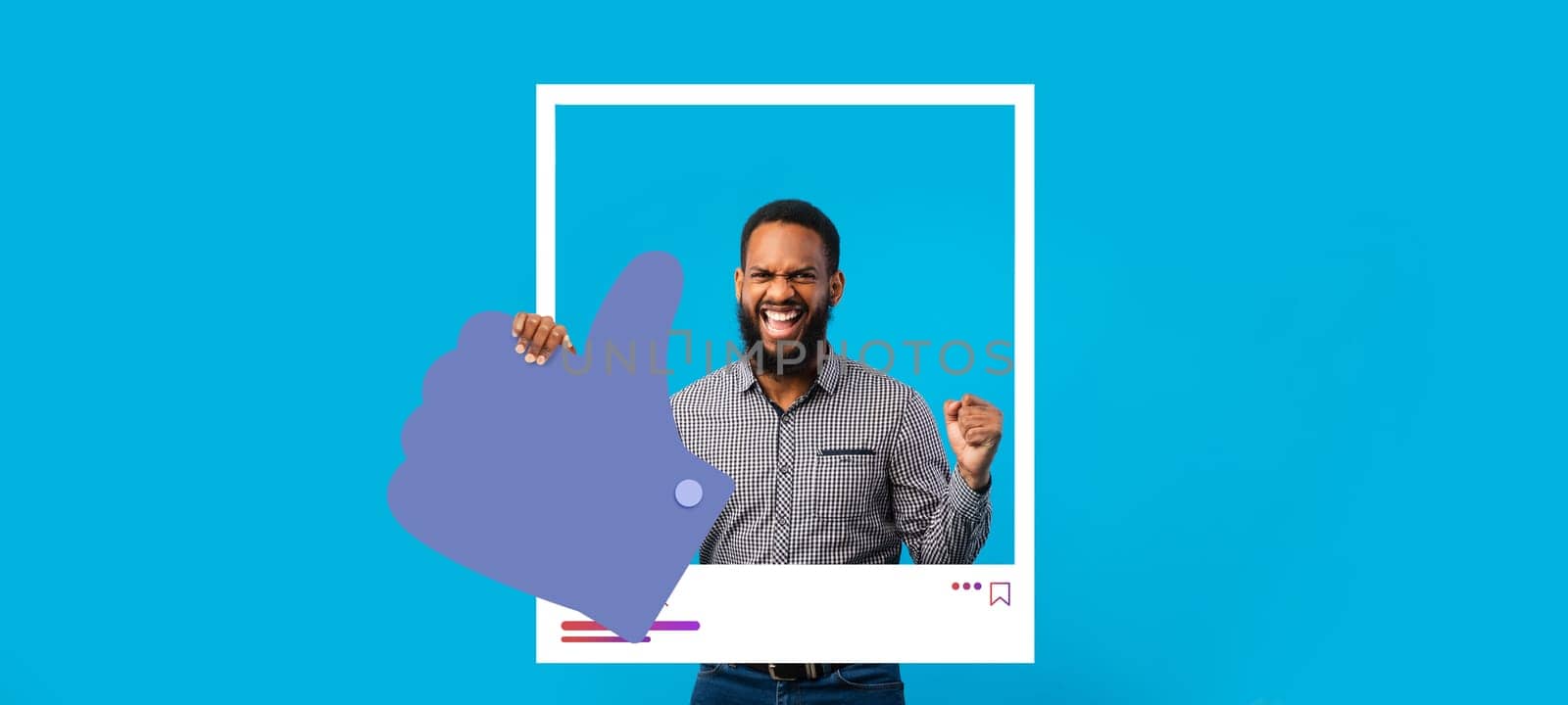 A man joyfully poses with a thumbs up gesture against a bright blue backdrop. He exudes enthusiasm, embodying the spirit of an online influencer sharing content with followers.