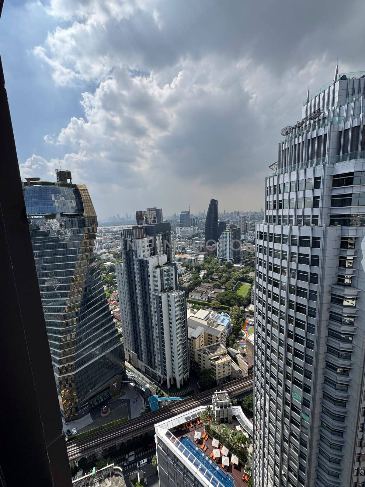 Skyscrapers in Thailand capital with skyline views in city center, downtown corporate area with breathtaking infrastructure for urban growth. Modern towers in the Bangkok metropolis.