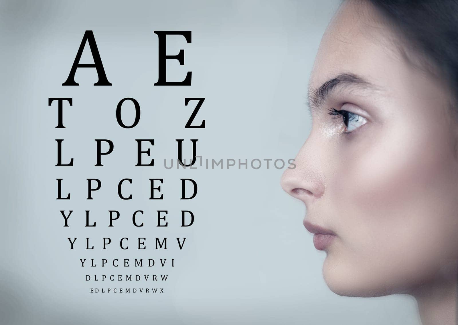A woman is positioned to the side, focusing on an eye chart featuring letters in varying sizes. The setting is bright, suggesting a clinical eye examination atmosphere.