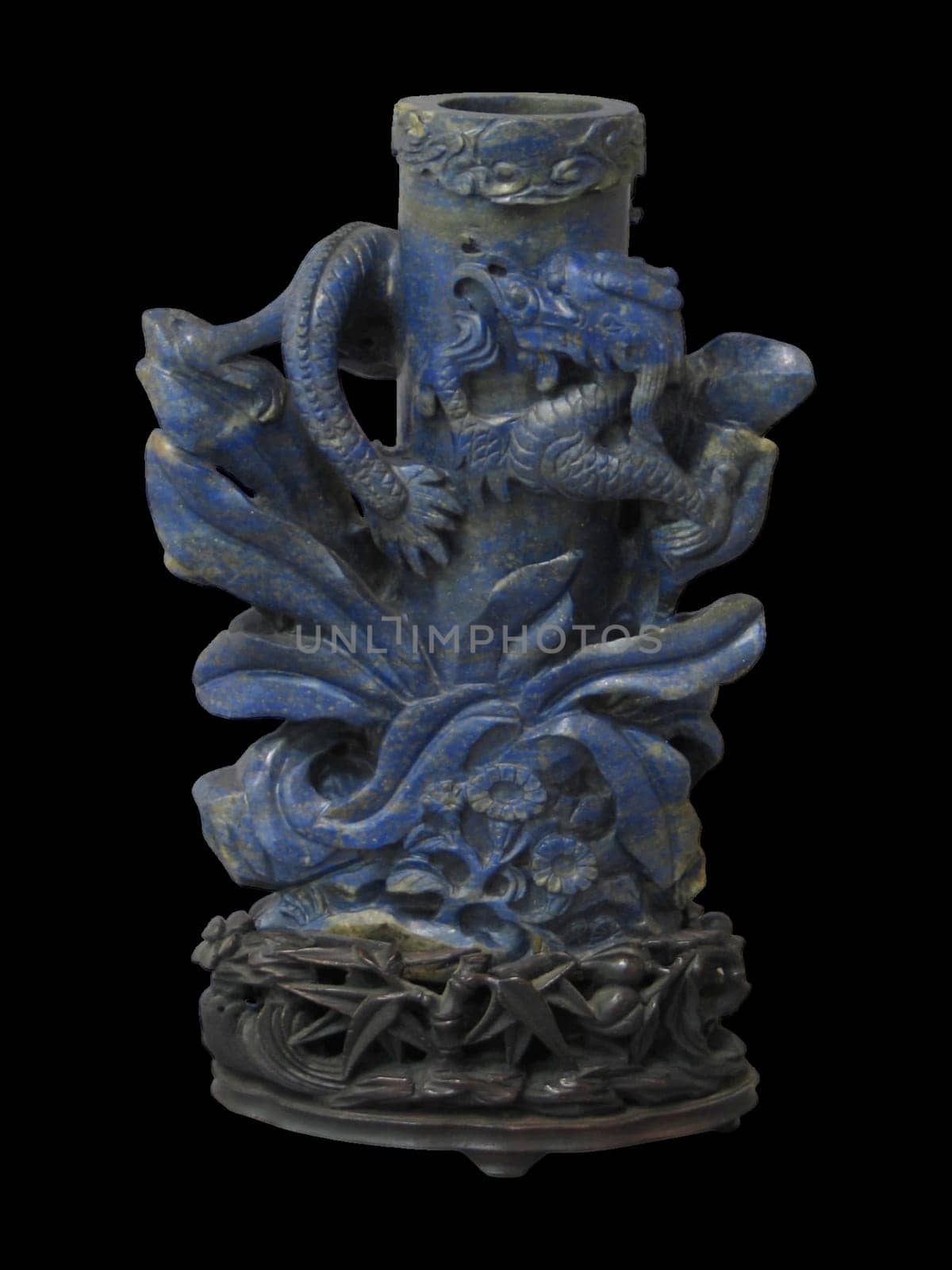 Ornate 18th-century Chinese vase carved from deep blue lapis lazuli, featuring intricate dragon and wave motifs. Rich color, detailed craftsmanship.