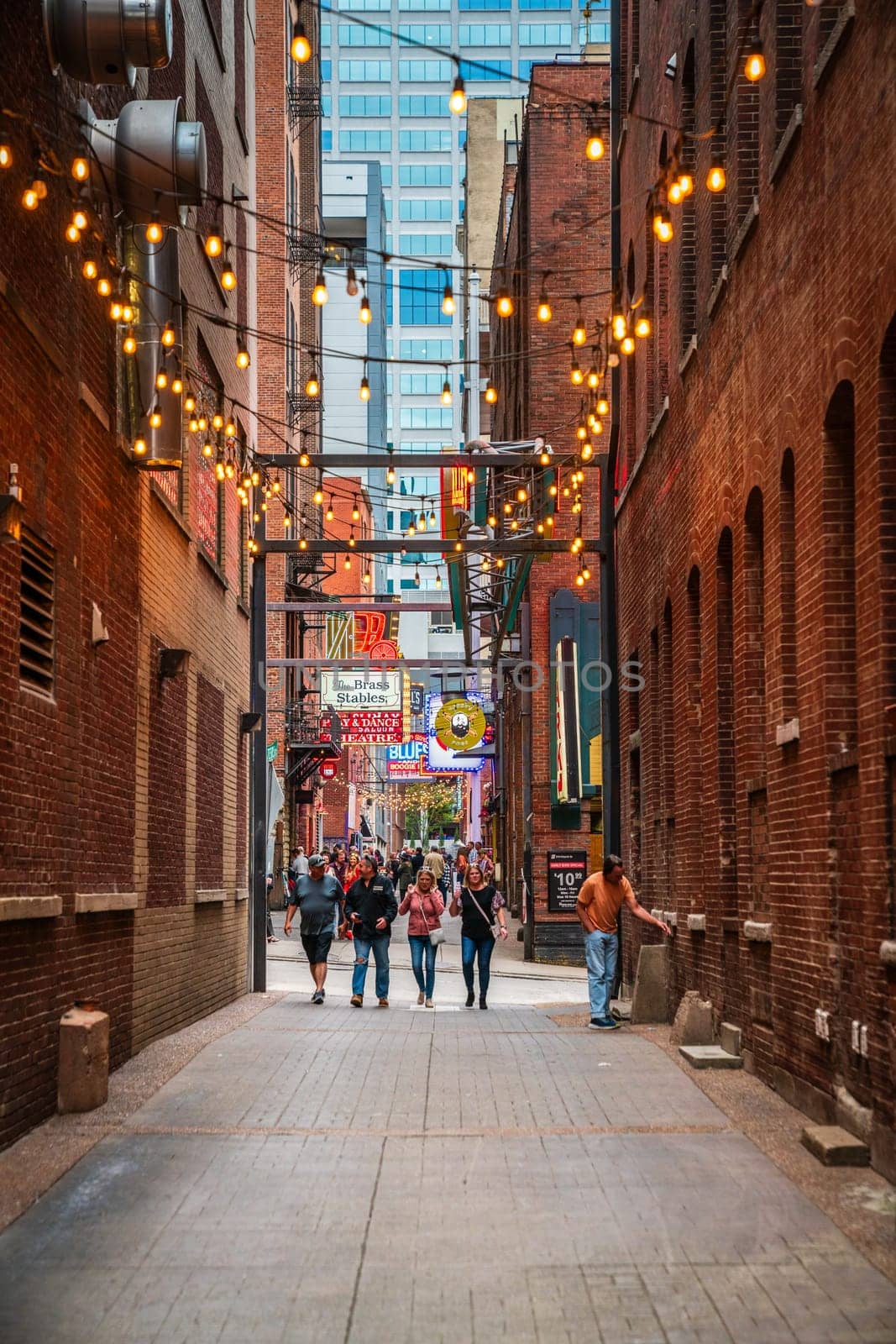 October 14, 2023, Nashville, TN: People are gathering in Printers Alley - a popular nightlife spot in Nashville, Tennessee