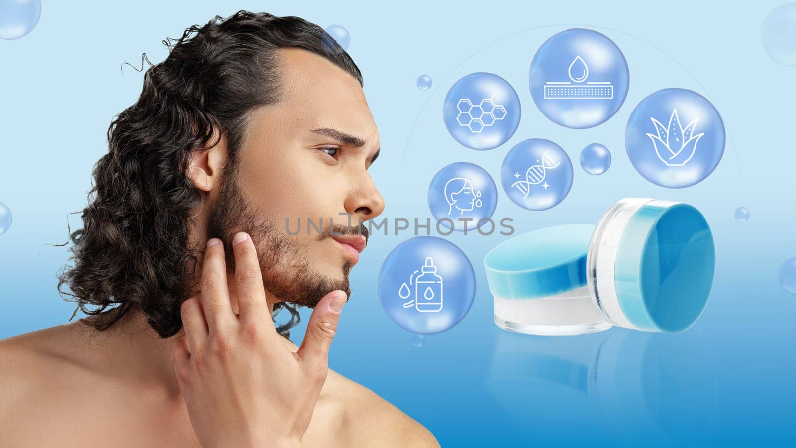 A man with curly hair is examining his skin while various skincare product icons float in the background. The blue tones emphasize the theme of skincare and hydration.