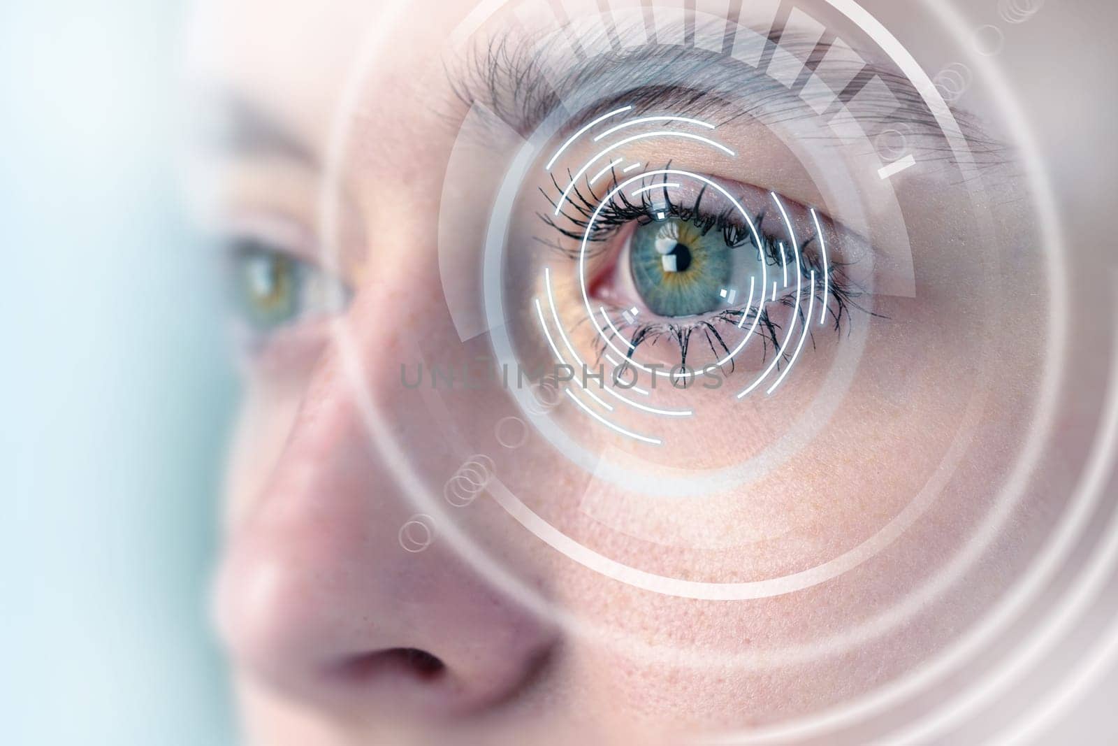 A person stares intently, showcasing detailed biometric patterns overlaying their eye. The futuristic design hints at advanced technology and digital innovation.