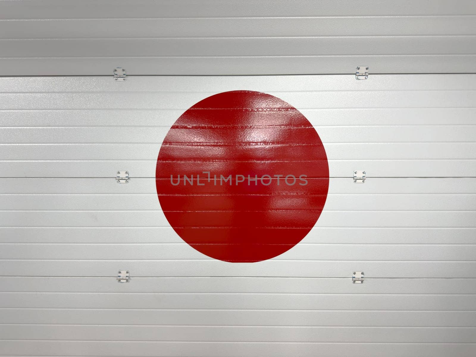 Creative integration of the Japanese flag into garage door design, symbolizing national identity, cultural pride and the influence of Japanese aesthetics in unexpected urban spaces