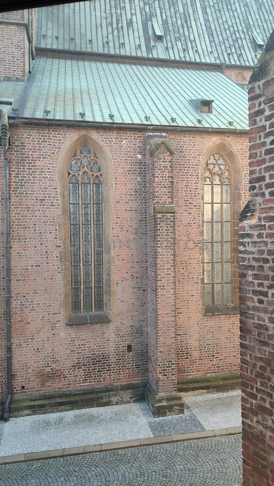 October 22 2024 Hradec Kralove, Czech Republic Europe, Kralov region, Kralovehradecky kraj, Gothic church windows shotlisttravel travel tourism outdoor city centre town architecture . High quality photo building