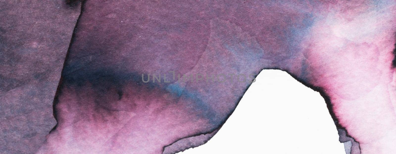 Soft strokes of watercolor create an abstract design with vibrant hues of violet and blue. The blend highlights fluid shapes emerging organically within the artwork during daytime.