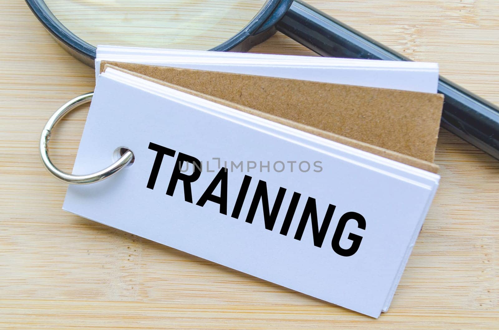 Training text on notepad suggesting staff development and onboarding initiatives.