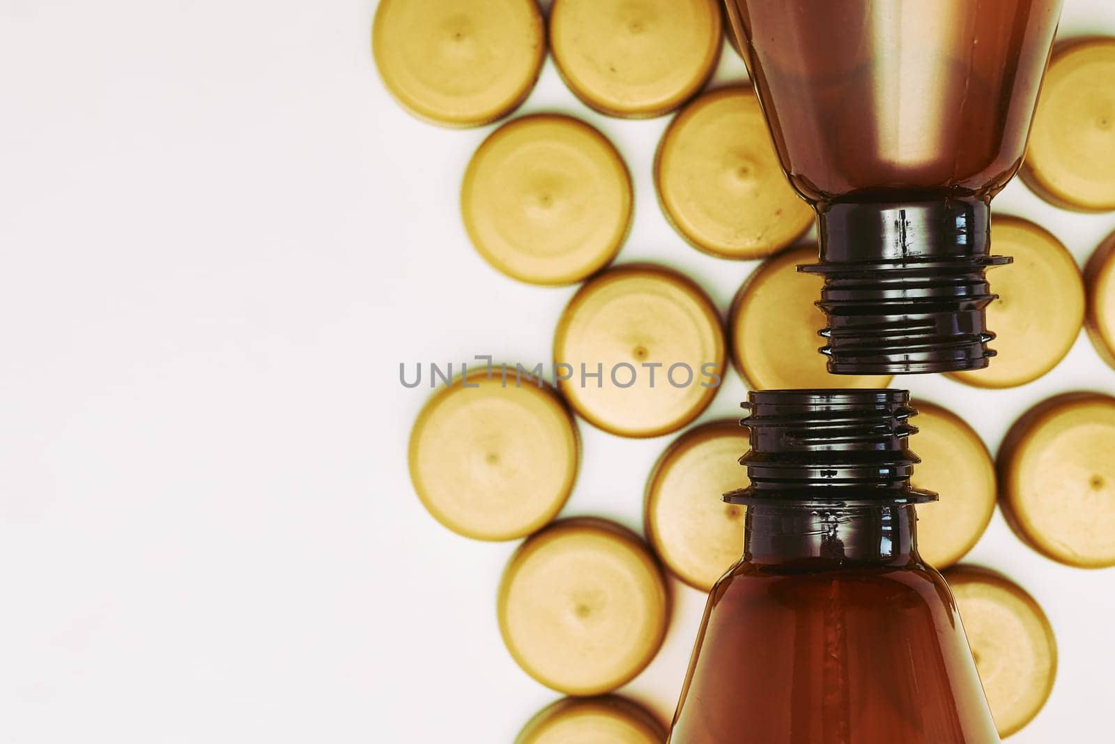 a container, typically made of glass or plastic and with a narrow neck, used for storing drinks or other liquids